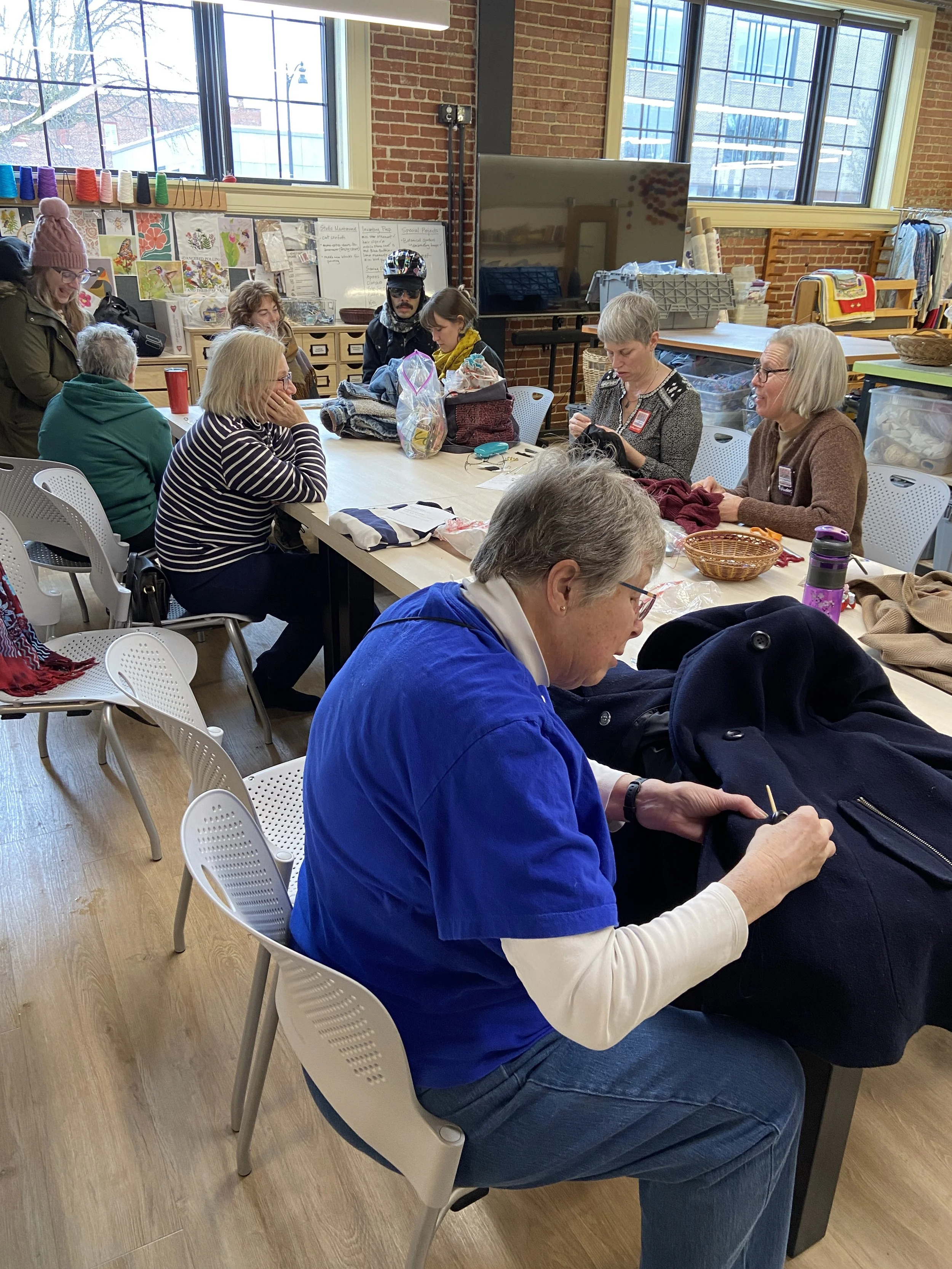  Community clothes mending day at Stitch Buffalo. Sponsored by M&amp;T Bank. ( Download 4.4MB file ) 