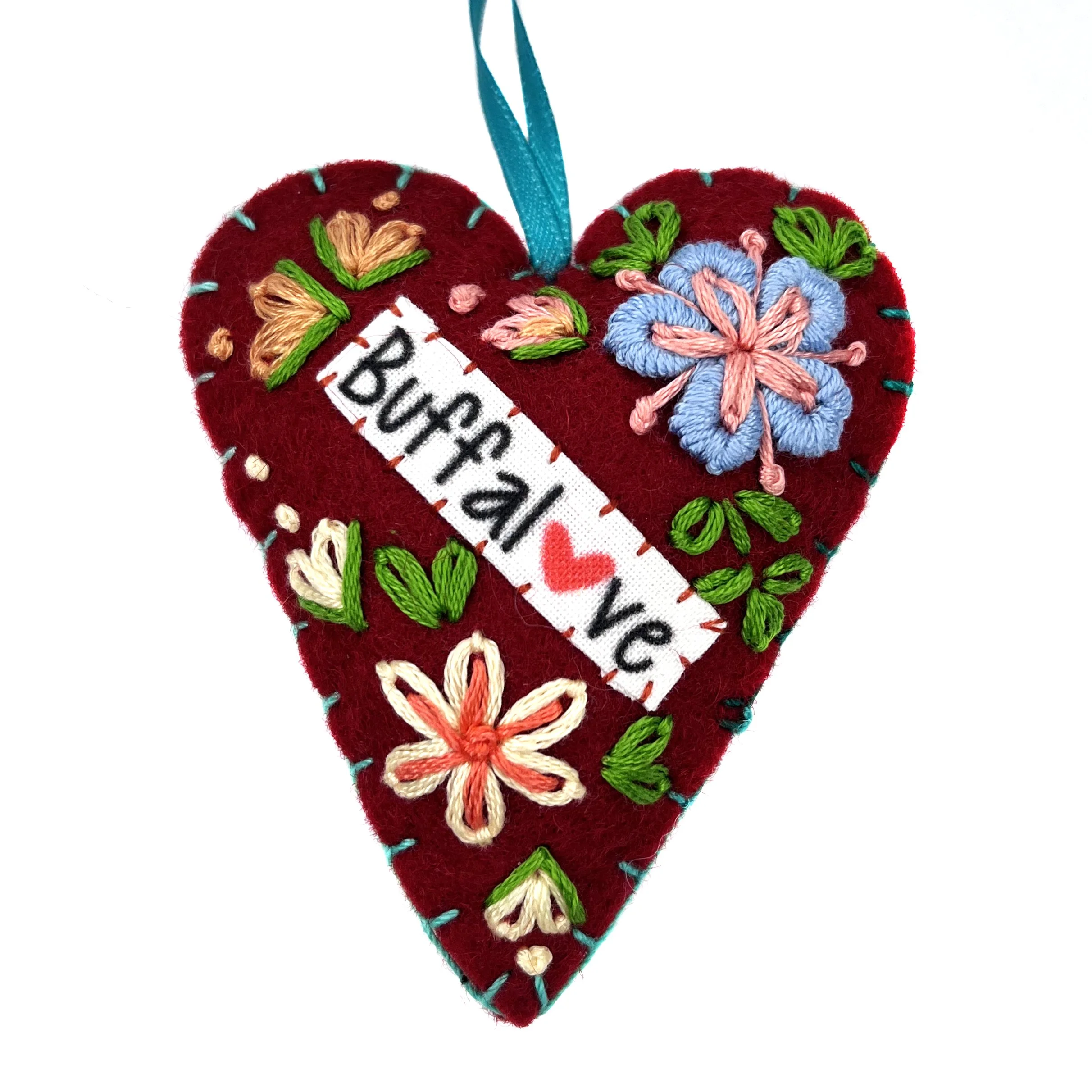  Hand-embroidered heart ornament by Ser Eh Paw (originally from Burma). 2025. ( download MB file ) 