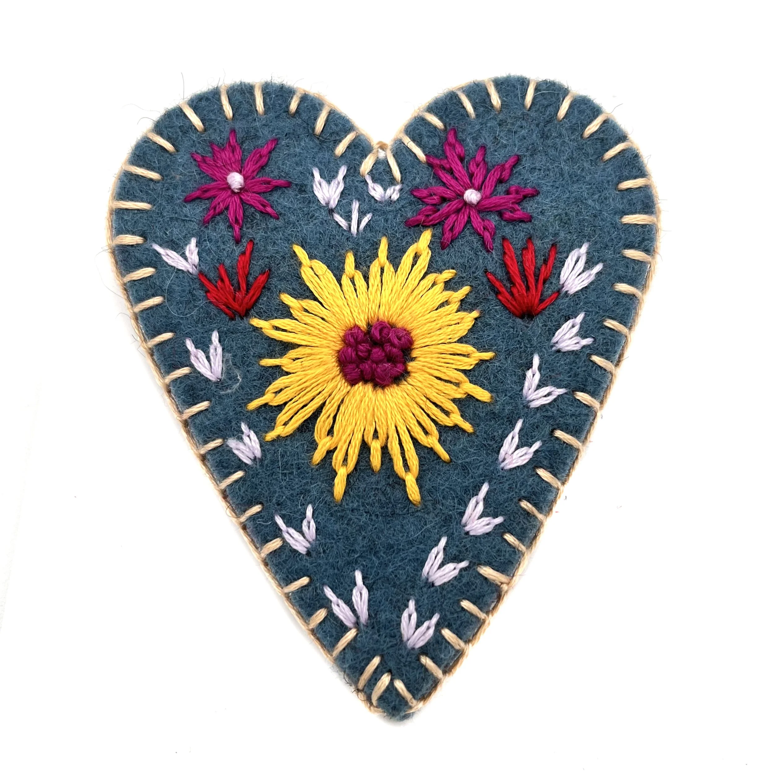 Hand-Embroidered Heart Pin by Buddhi Rai