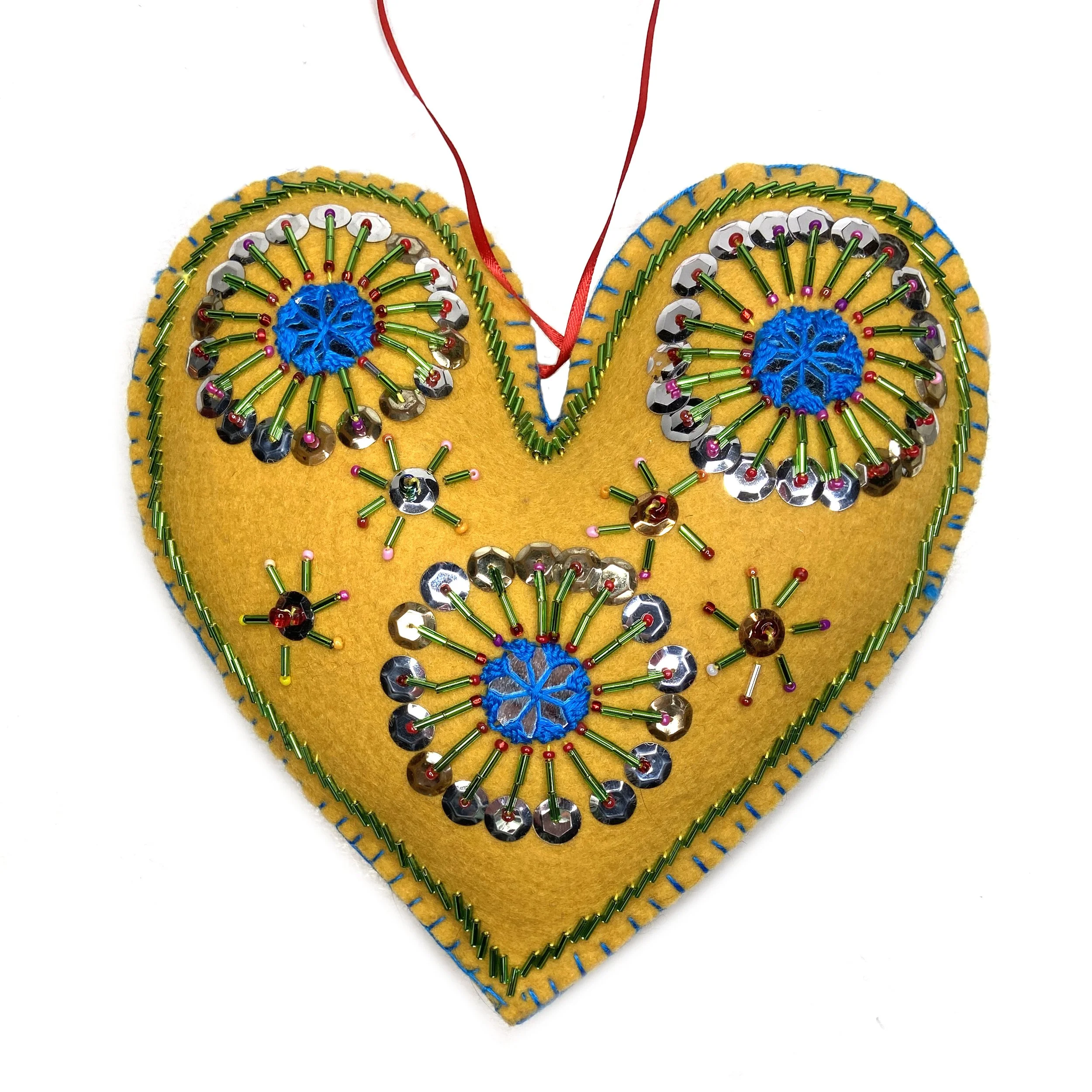 Hand-Embroidered Heart Wall Art—by Noor Bibi