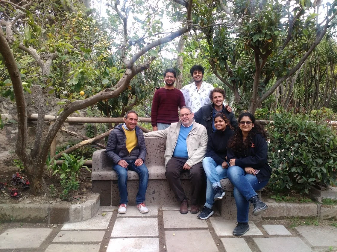 The completed bench with tufo master Luigi seated on the left.