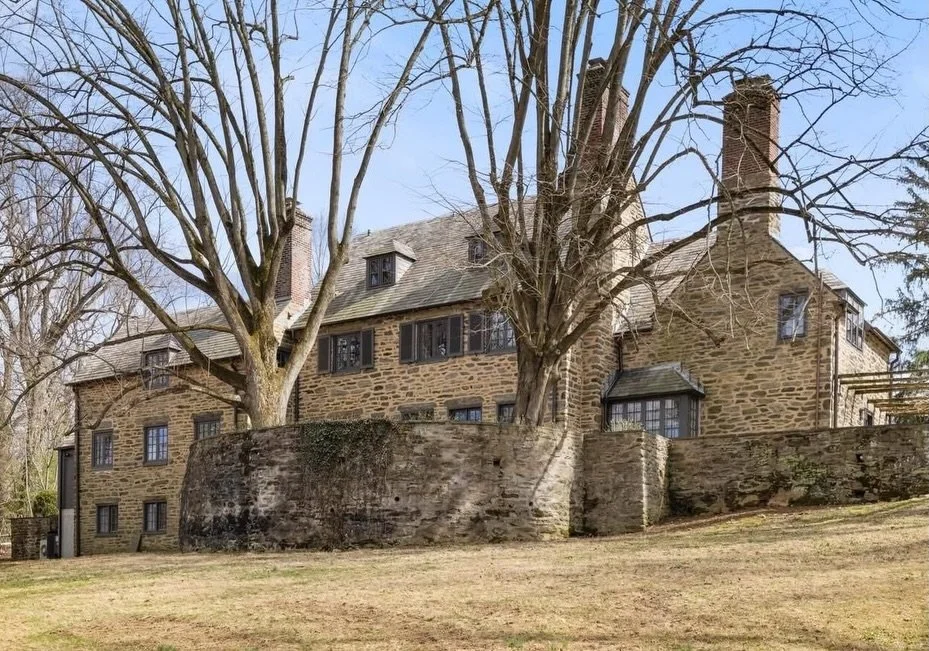 Rooted in 1925, styled for now.
English country charm meets modern ease on nearly two acres in lush Chestnut Hill. French doors for days, bluestone terraces, and a kitchen that quietly steals the show.

We love when history shows up this well dressed