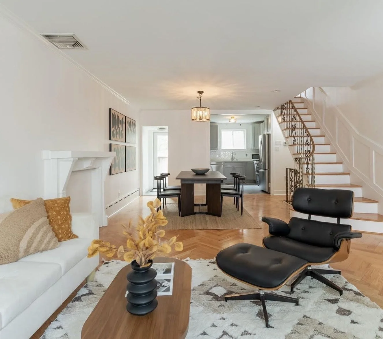 Mid-century details, chevron floors, dreamy light, and a stage that understood the vibe immediately.

One block from bustling Passyunk Ave and somehow still impossibly cozy. We love a house with good bones and good taste.

1702 S 11th Street: $519,00