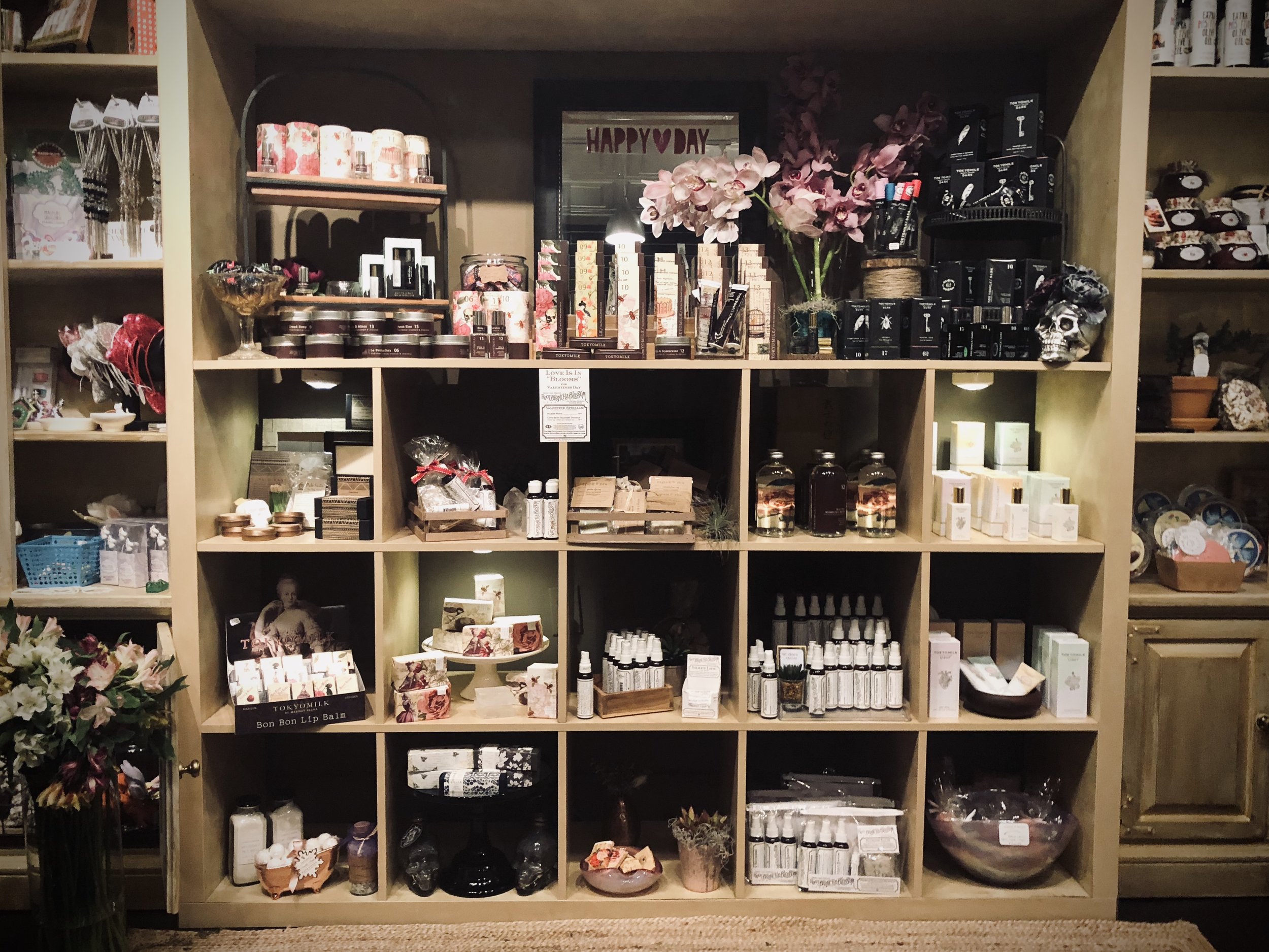 Our Bath & Body wall, includes TokyoMilk, Root, Branch & Blossom, Lovewild Design.