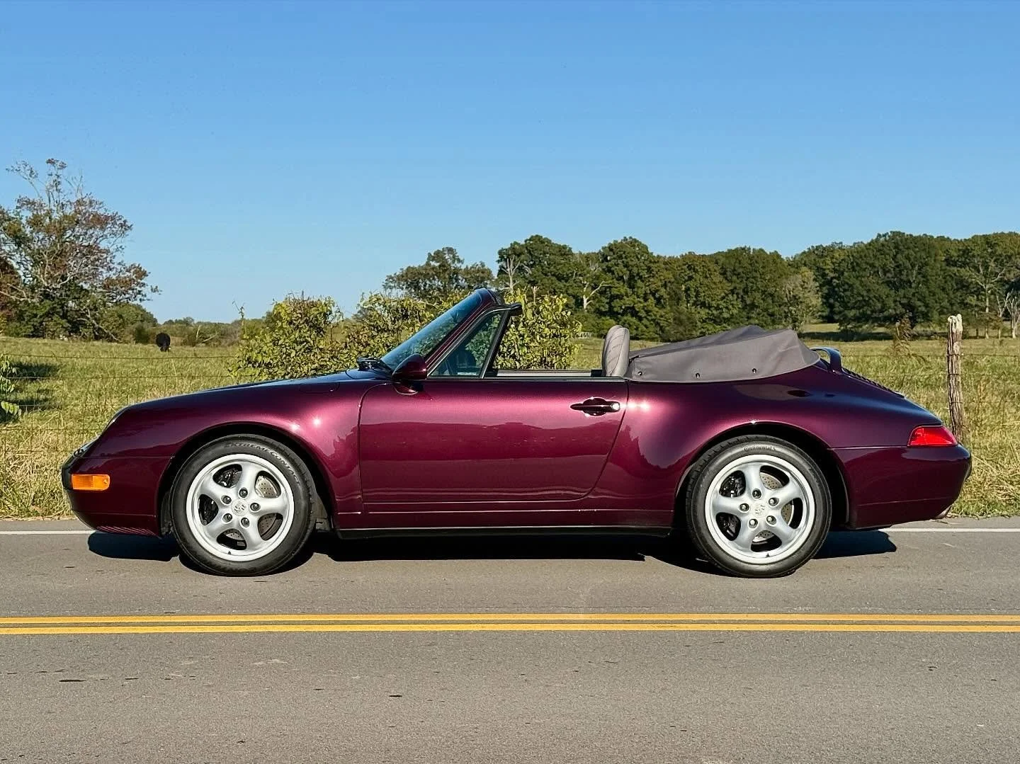 🚨 PTS ALERT! 🚨 1995 911 Cab 6-Speed finished in PTS Amethyst Metallic over cloth PORSCHE interior. Factory rear seat delete! 59k miles. 2-Owner. Window sticker. 2-keys……what do I do with this absolute unicorn?! Retail? @pcarmarket ? @