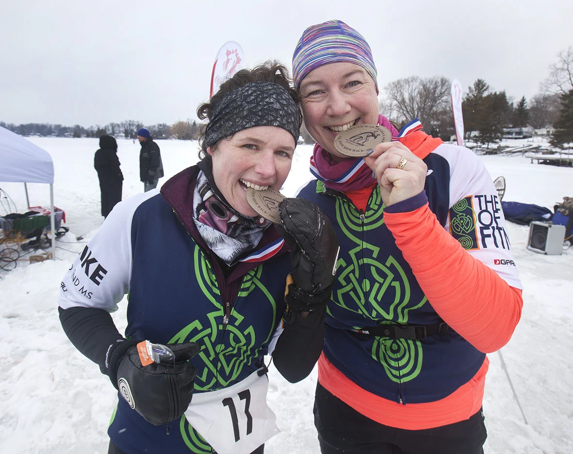 Adults with finishers medals.JPG