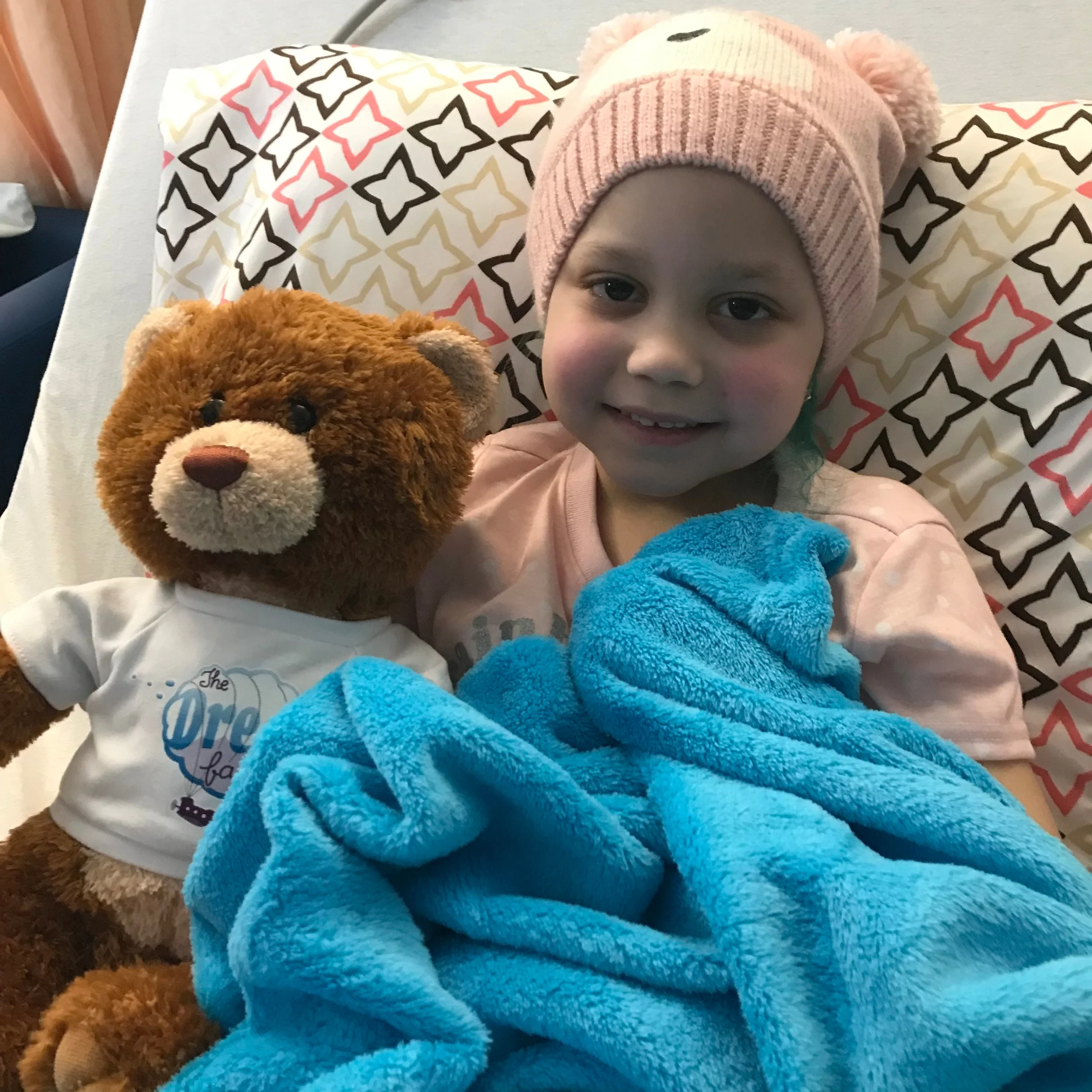 Pictured: Drea with her very special Dream Factory Bear and Blanket