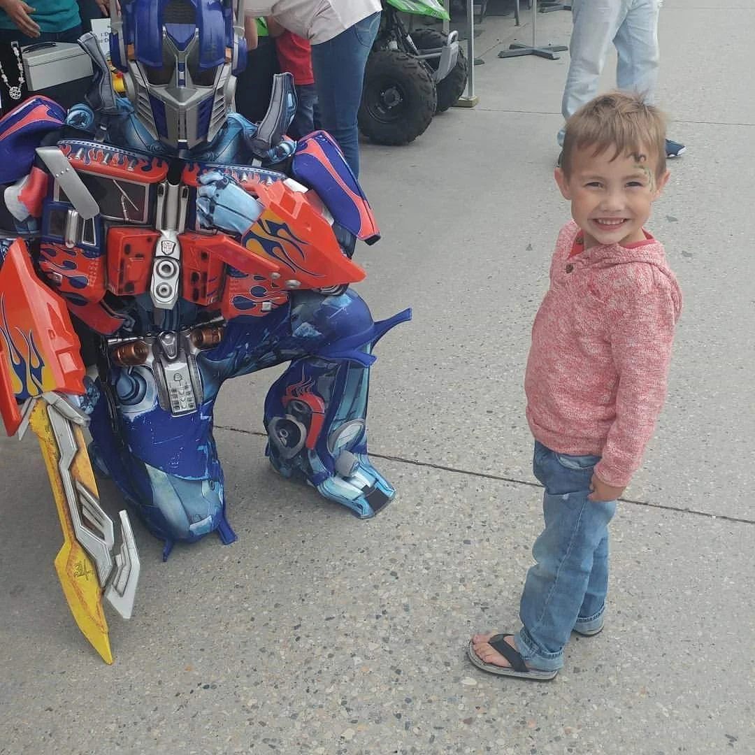 Pictured: Jaxx meeting one of his favourites - Optimus Prime!