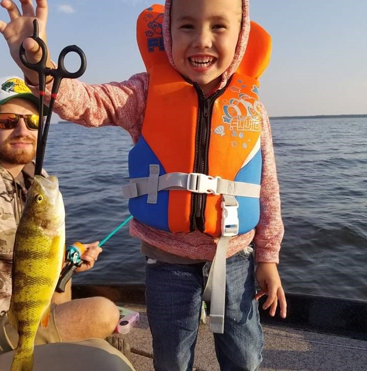 Pictured : Jaxx with the catch of the day - hook, line, and sinker!