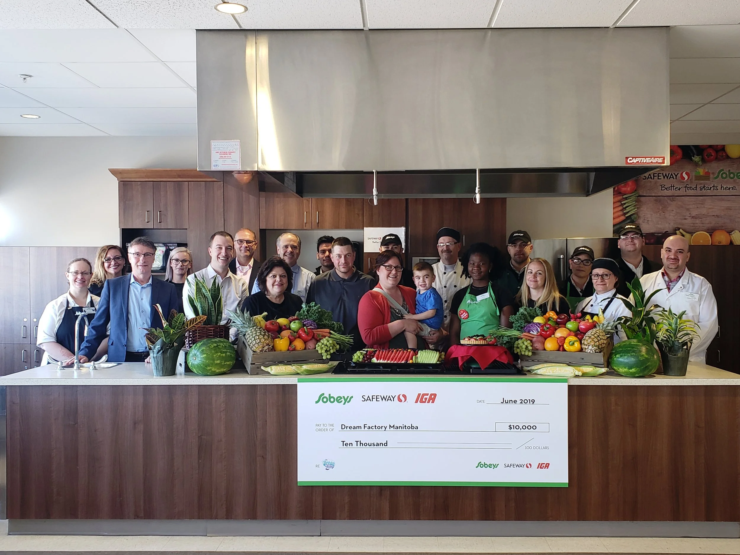 Pictured: The team at Sobeys Extra (2850 Pembina) celebrates this exciting new partnership with The Dream Factory staff and Dream Kid Karsen and his family.