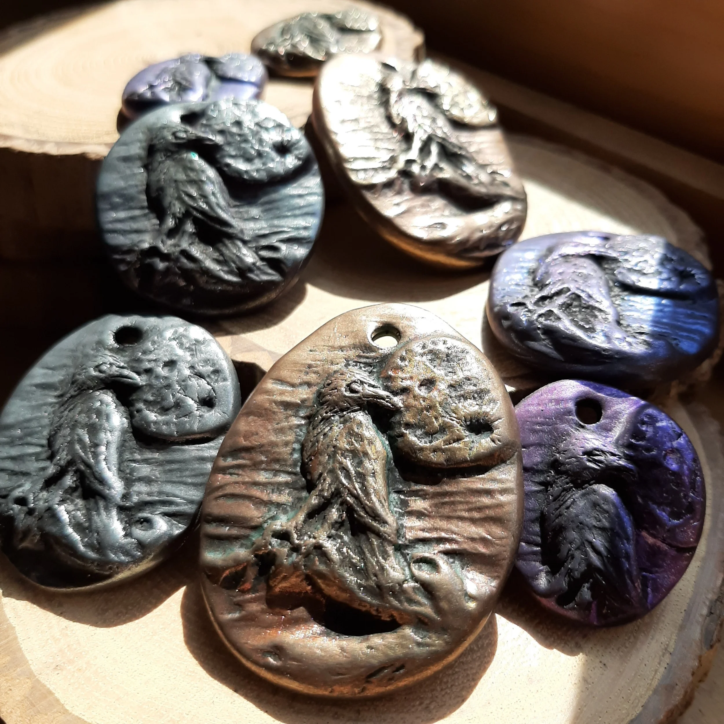 Because I want the raven to look dark, I'm playing with color combinations that I rarely use. In particular, interference violet seems particularly useful. I may try more variations.