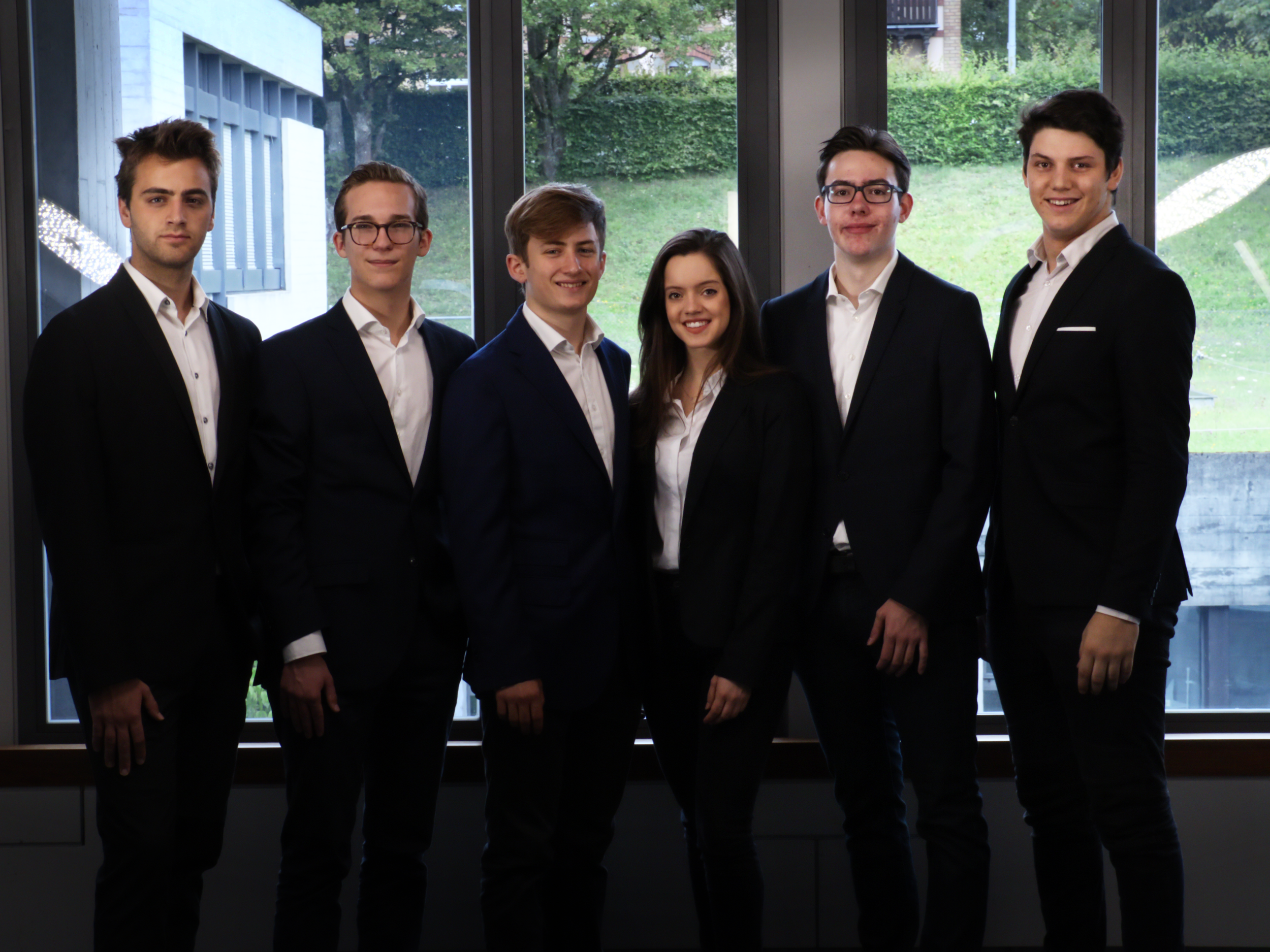 From left to right: Balázs Bornemisza (Head of Socials), Manuel J. Constam (Head of Debates), János Benz (President), Gabriela Tedesco Romani (Head of Finance), Sebastian Linke (Head of Debates), Evann Treceño (Vice-President and Head of Marketing)