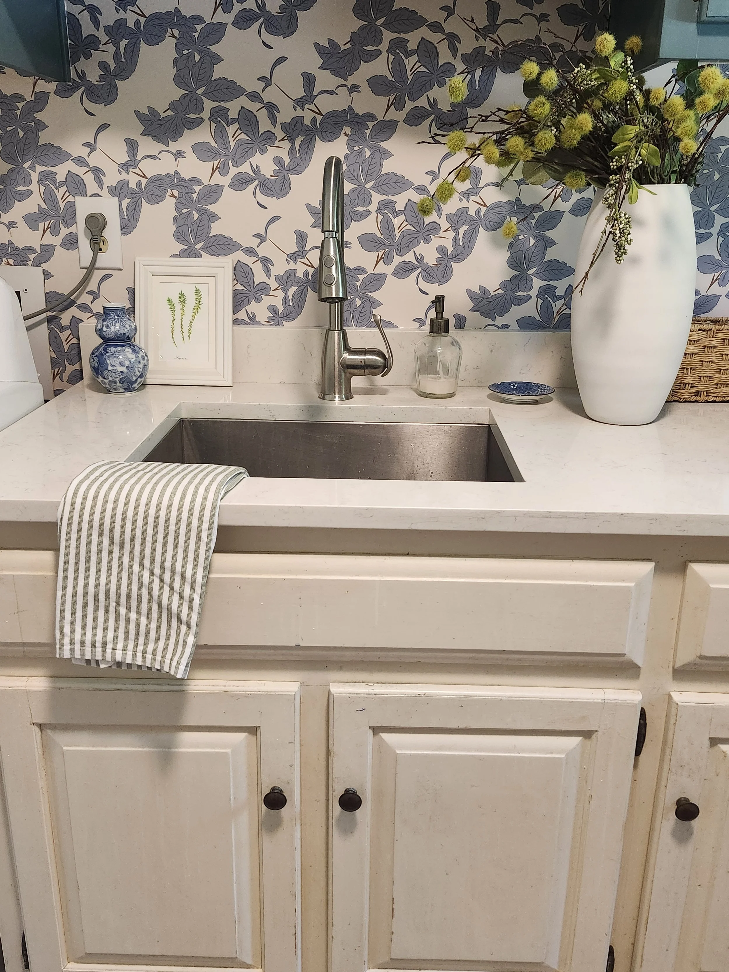 Giving a Laundry Room A Stylish Refresh with Wallpaper