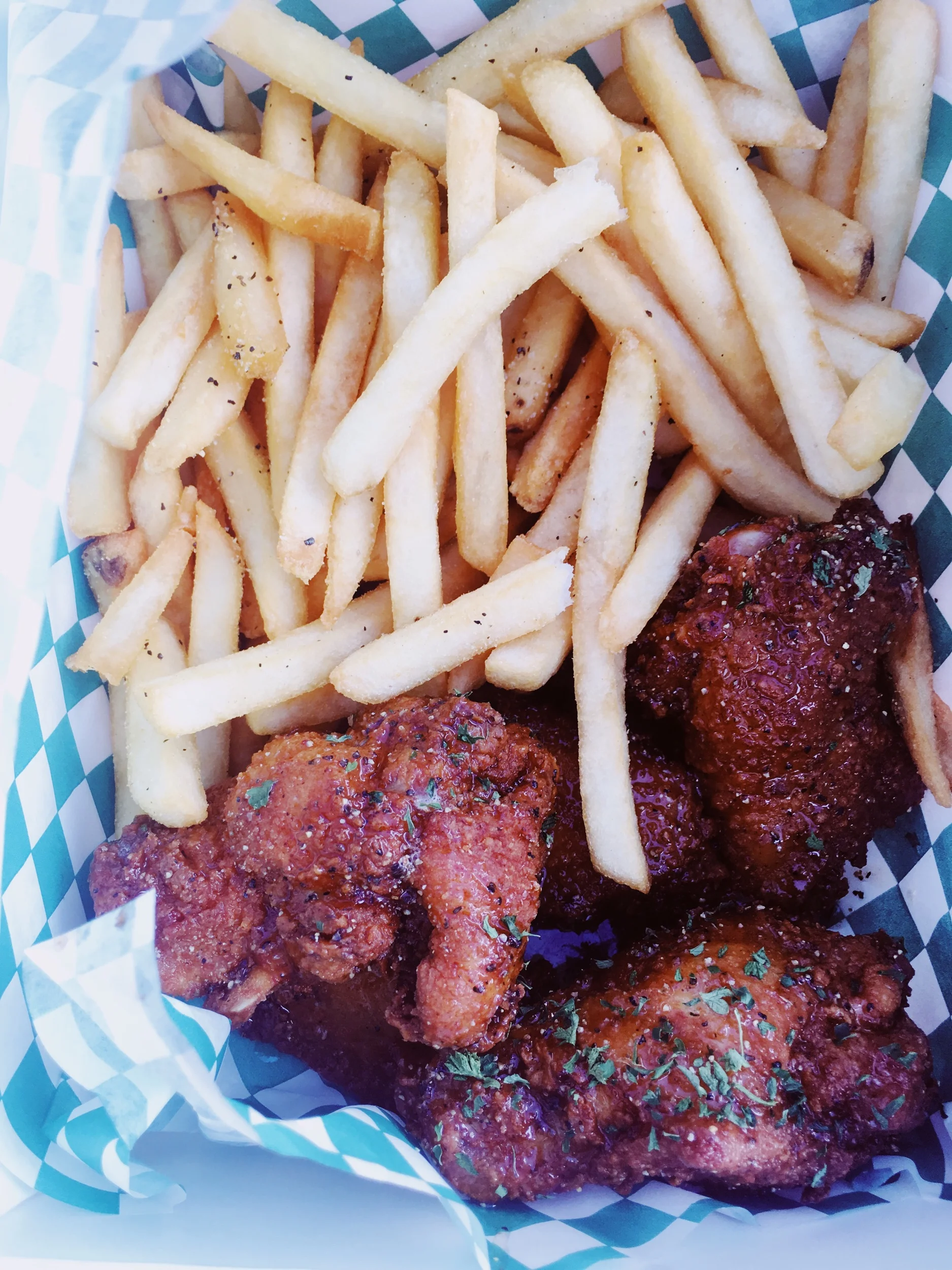 Trap Kitchen Portland Oregon. The community and conversation was incredible. The hospitality and customer service was some of the best I had. However, the chicken wings were a breaded too much and the wings had too much fat on it. They’re were fried…