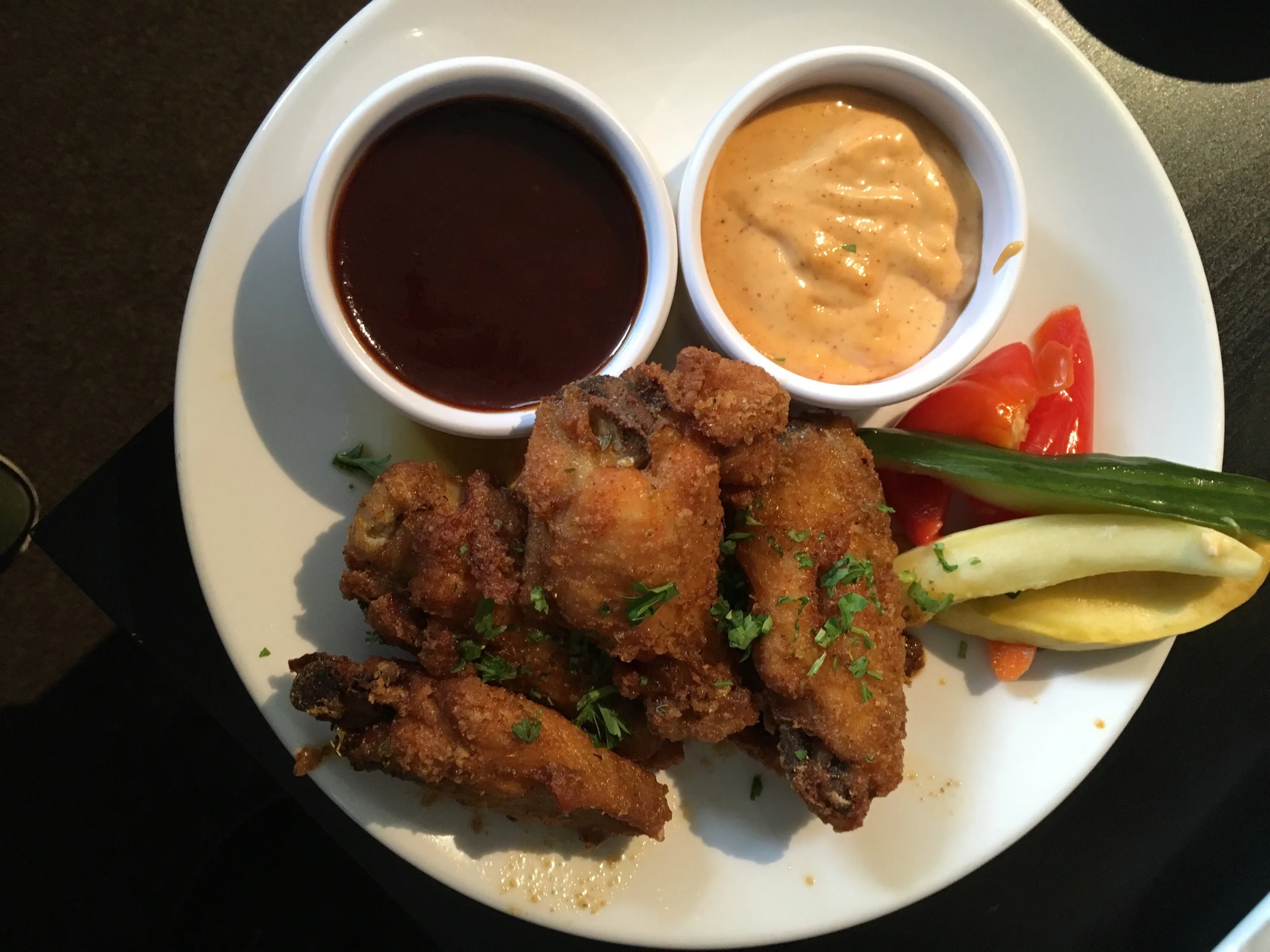 BEER BRAISED CRISPY CHICKEN WINGS, … A descent crisp on the exterior but it could have had a better crunch when chewing. Located in Portland Oregon 7.5/10 at Brix Tavern.