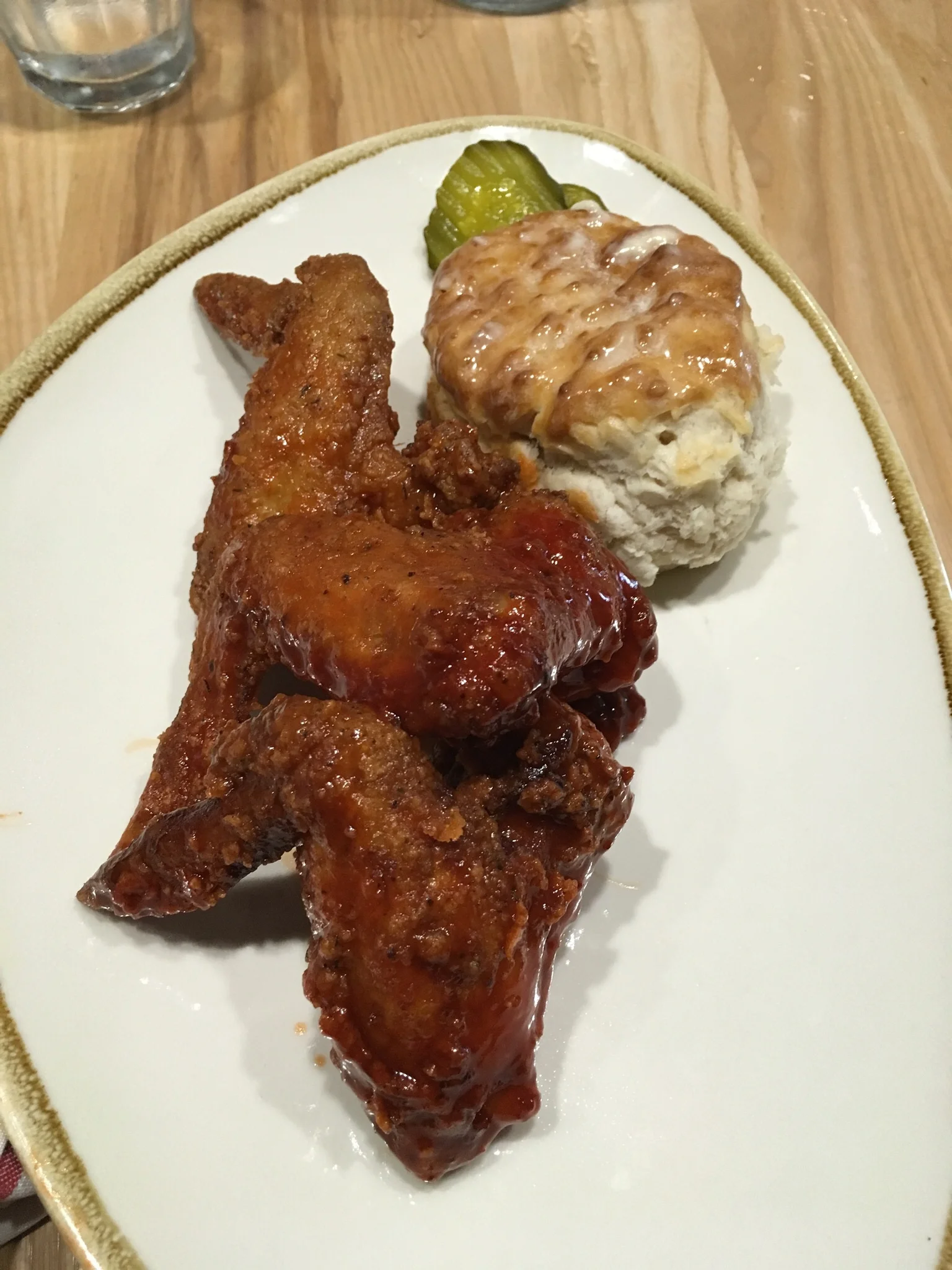 Ludacris’ “Chicken and Beer” inside of Atlanta airport. 3 chicken wings w/ “Hotlanta” sauce. The sauce was really good! A very rich flavor and a hint of heat with somewhat a sweet accent. The chicken could have been fried better though. It was cooke…