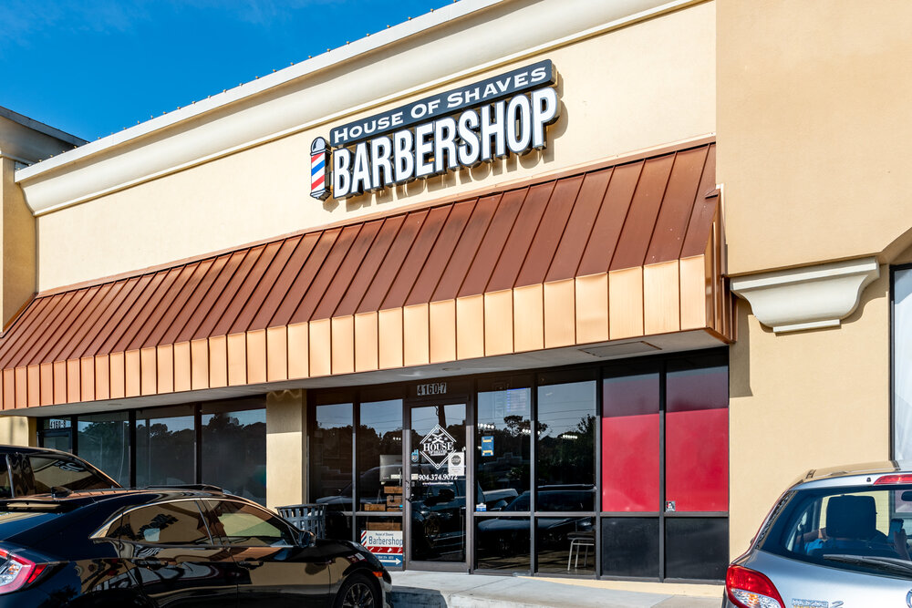 Exterior facade of House of Shaves Barbershop in Jacksonville, Florida. 