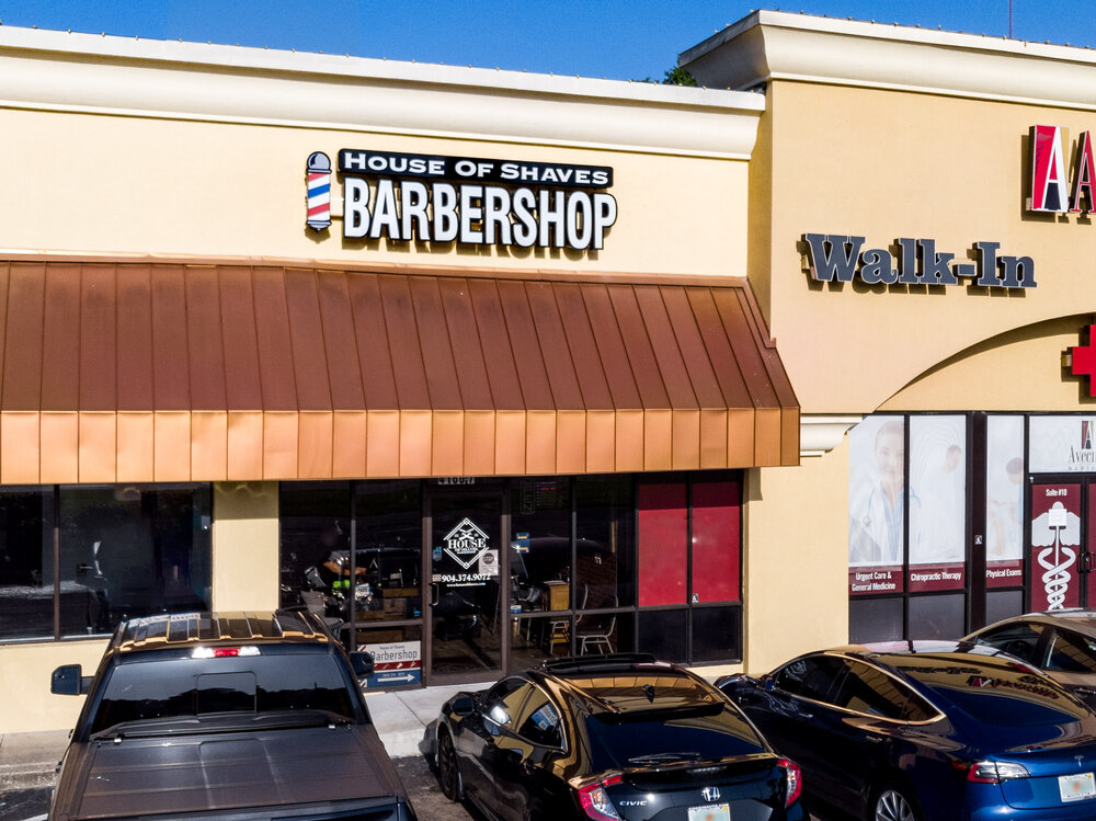 Exterior facade of House of Shaves Barbershop in Jacksonville, Florida. 