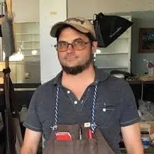 Community artist Malcolm Potek specializes in glass work and would like to run classes out of his studio.
