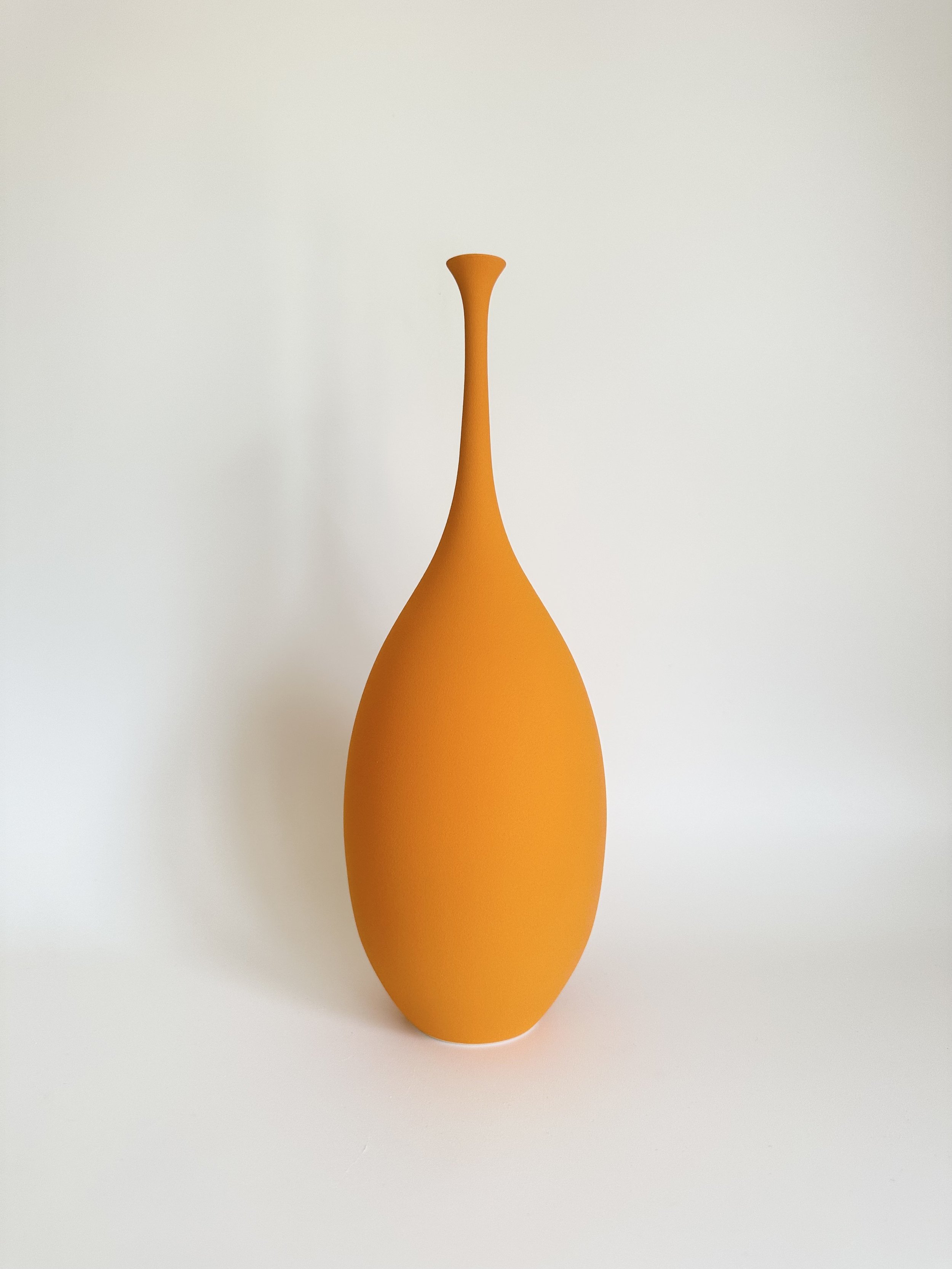 very small teardrop dry tangerine orange.