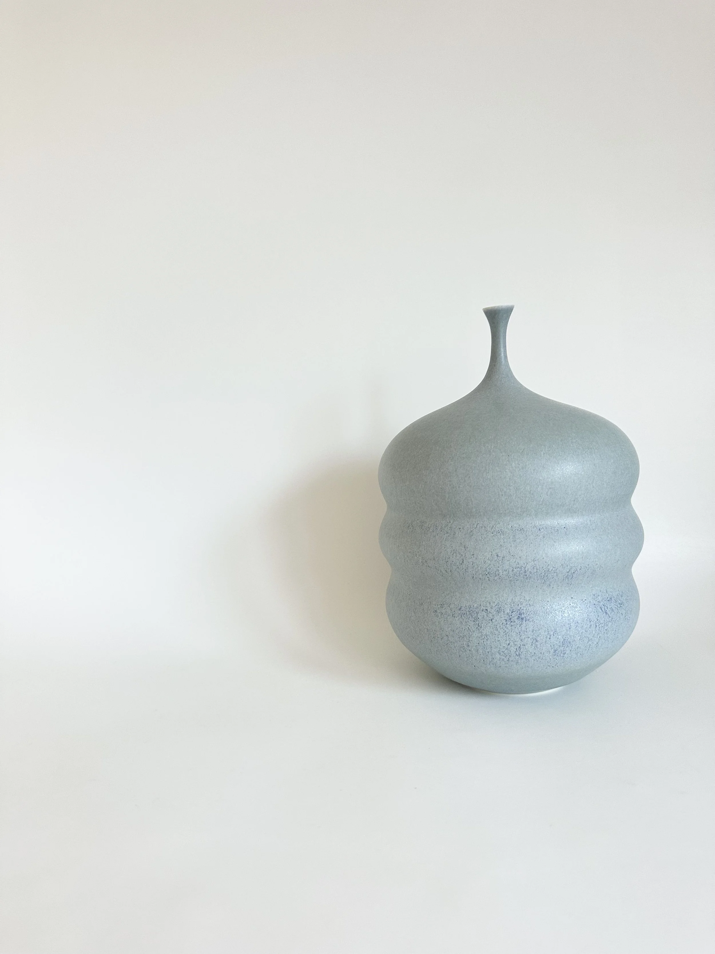 small curvy bottle eggshell blue