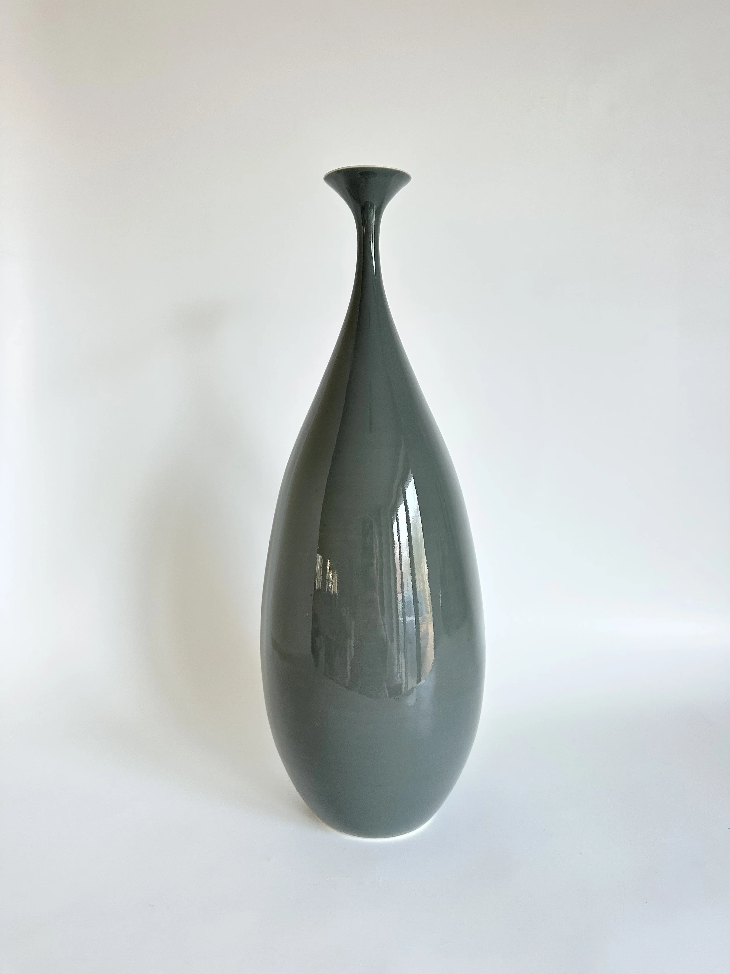 small teardrop shiny dark grey