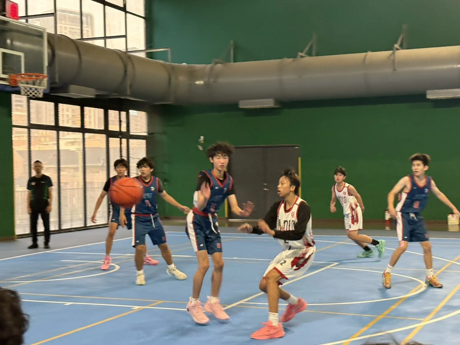 MDID Basketball Team Takes on AST in a Thrilling Match! 