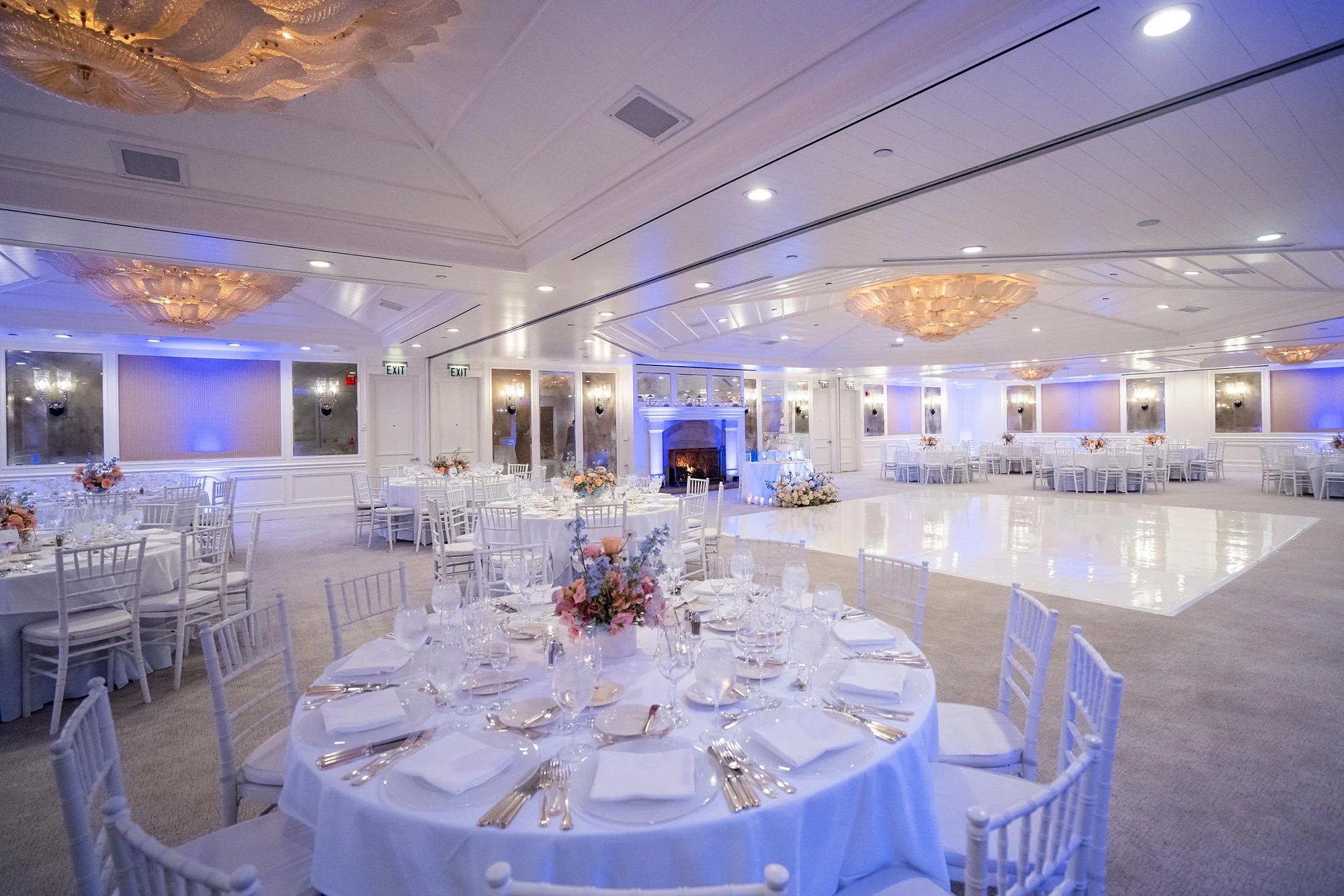Wedding reception in the Grand Salon at Shutters on the Beach with white decor and dance floor