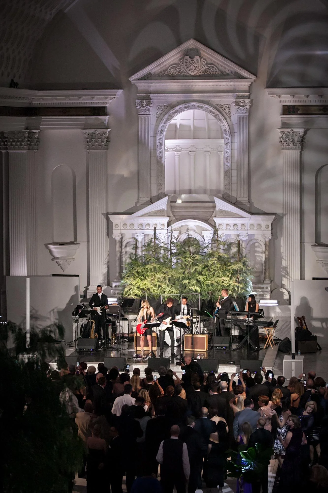 Evening reception with live band and guests dancing at a cathedral wedding at Vibiana in Los Angeles