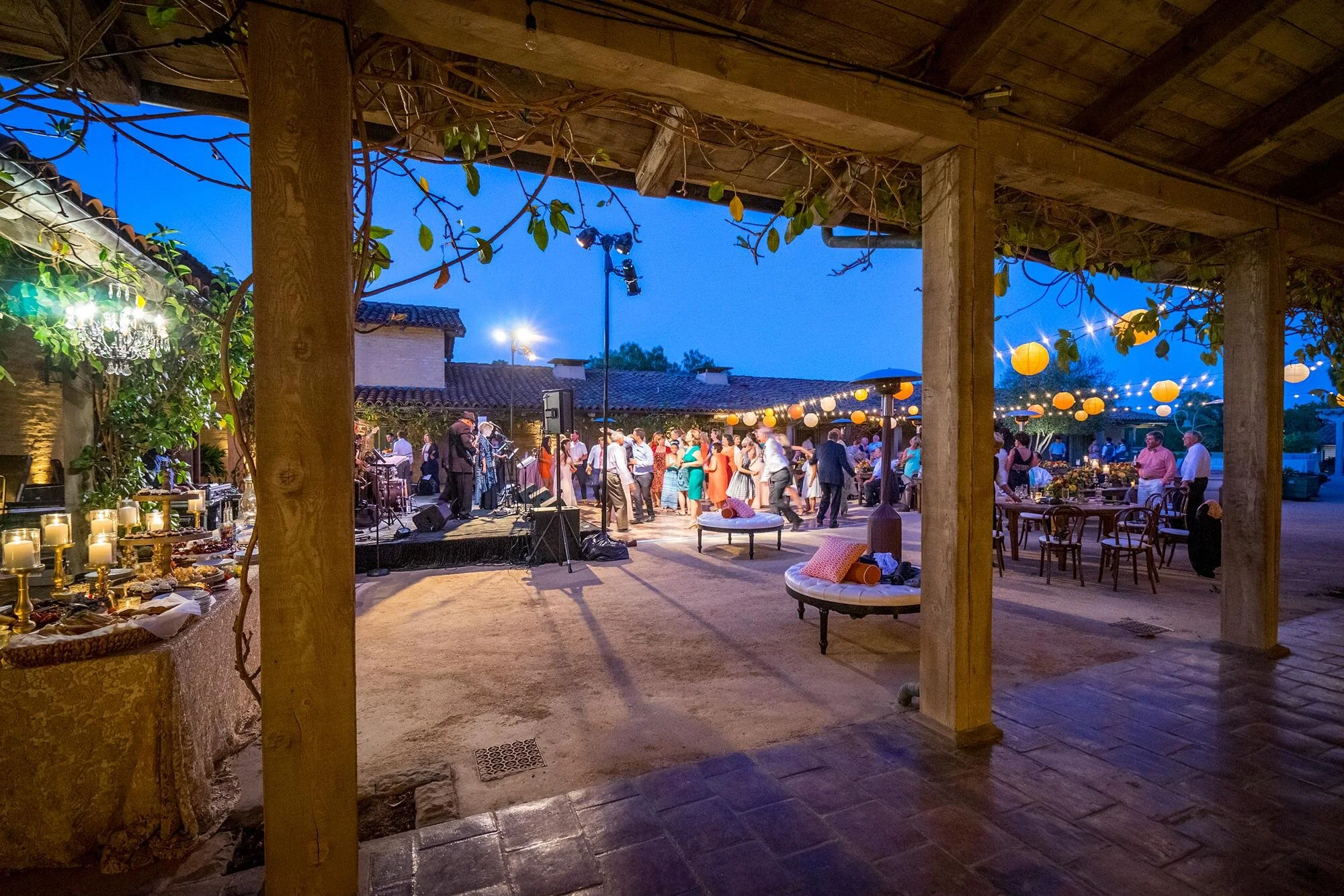 Wedding reception guests dancing in the Courtyard at Santa Barbara Historical Museum