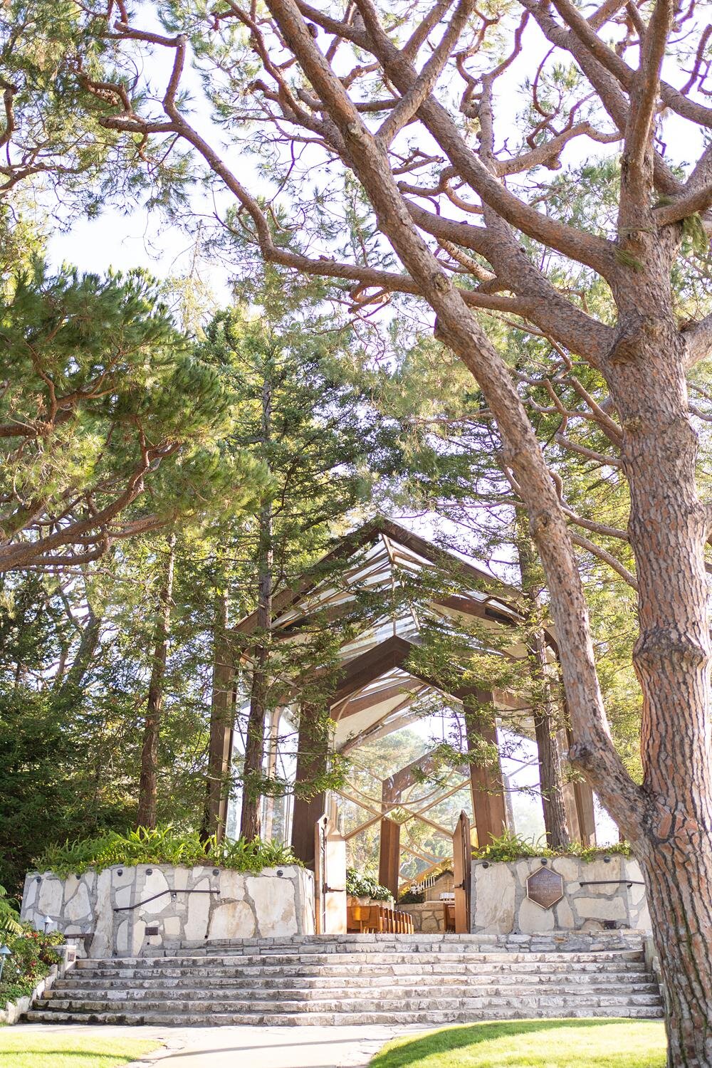 Wedding venue exterior of Wayfarers Chapel framed by trees on a clear day