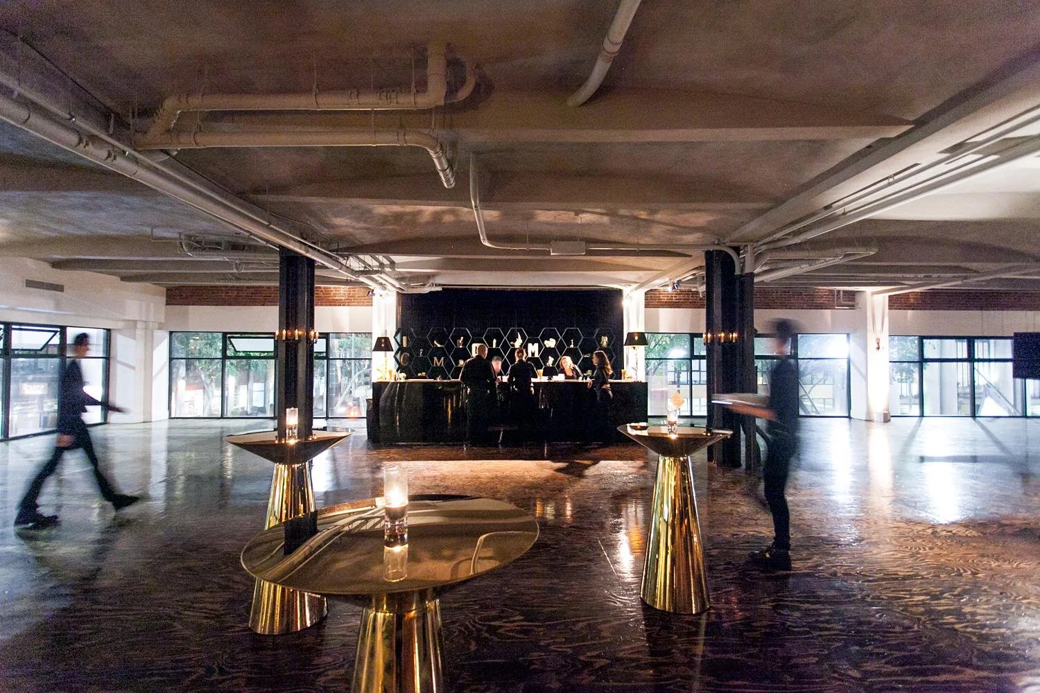 Wedding reception with modern bar and downtown views in The Mezz at the Alexandria Ballrooms