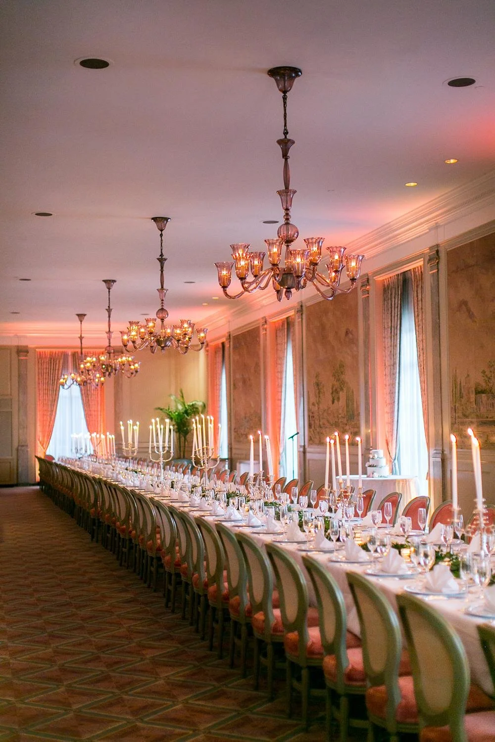 Wedding reception long table with candles and florals in the Second Floor Dining Room at the California Club