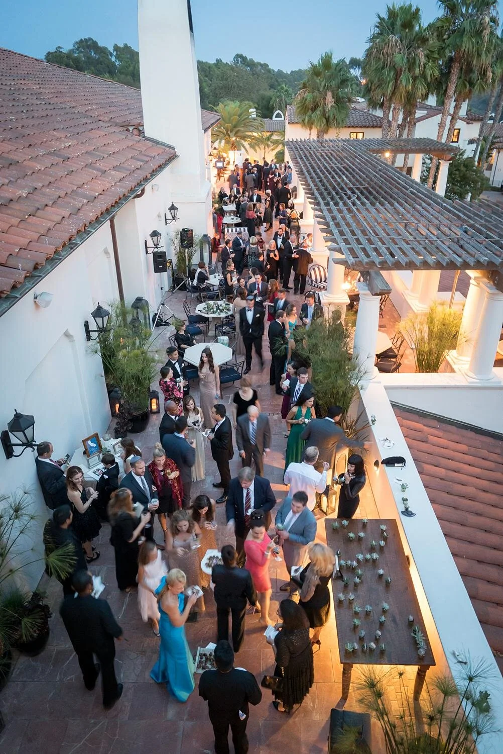 Wedding cocktails on the Terrace at Ritz Carlton Bacara with guests mingling during cocktail hour