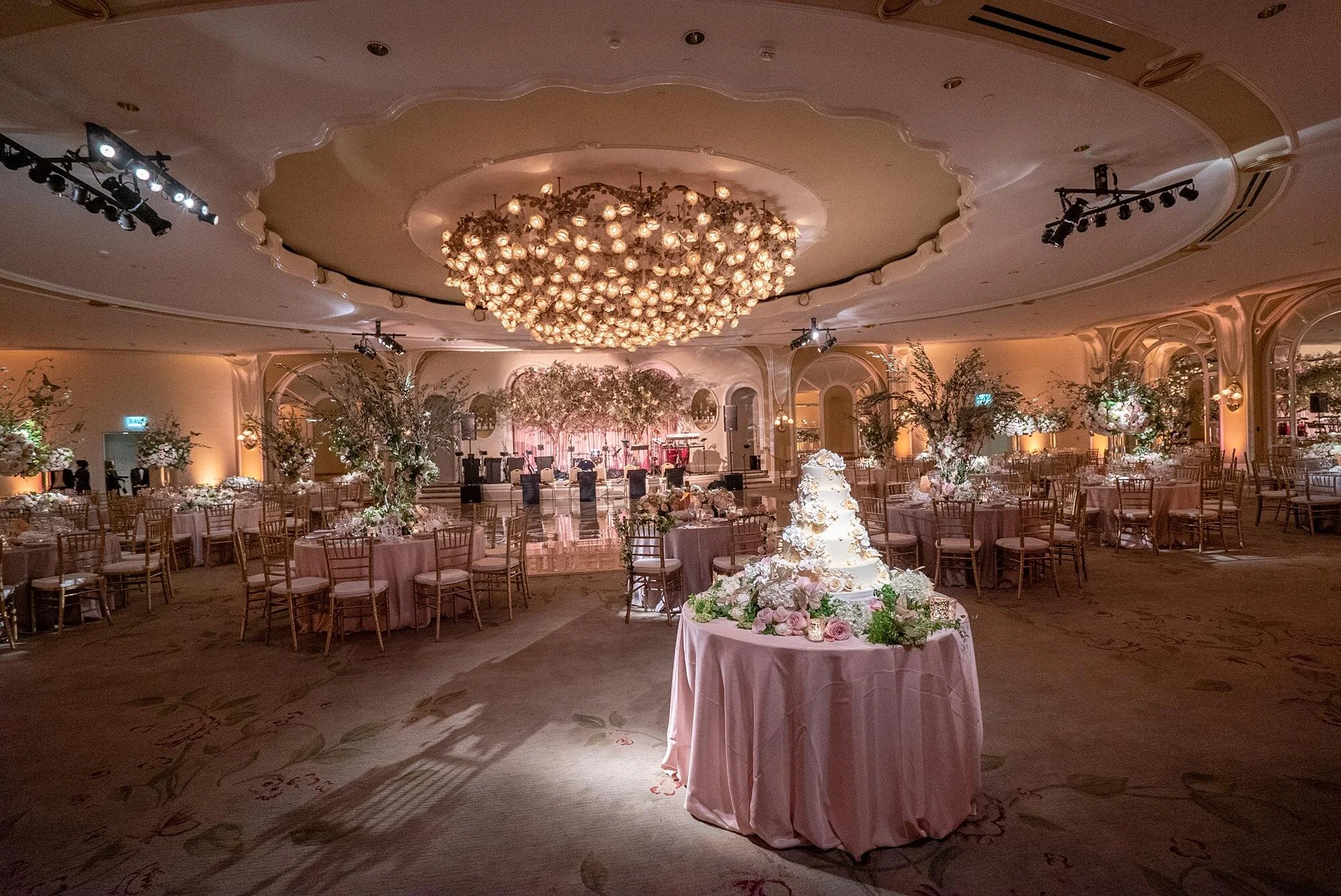 Wedding reception in the Crystal Ballroom at the Beverly Hills Hotel with garden-inspired decor
