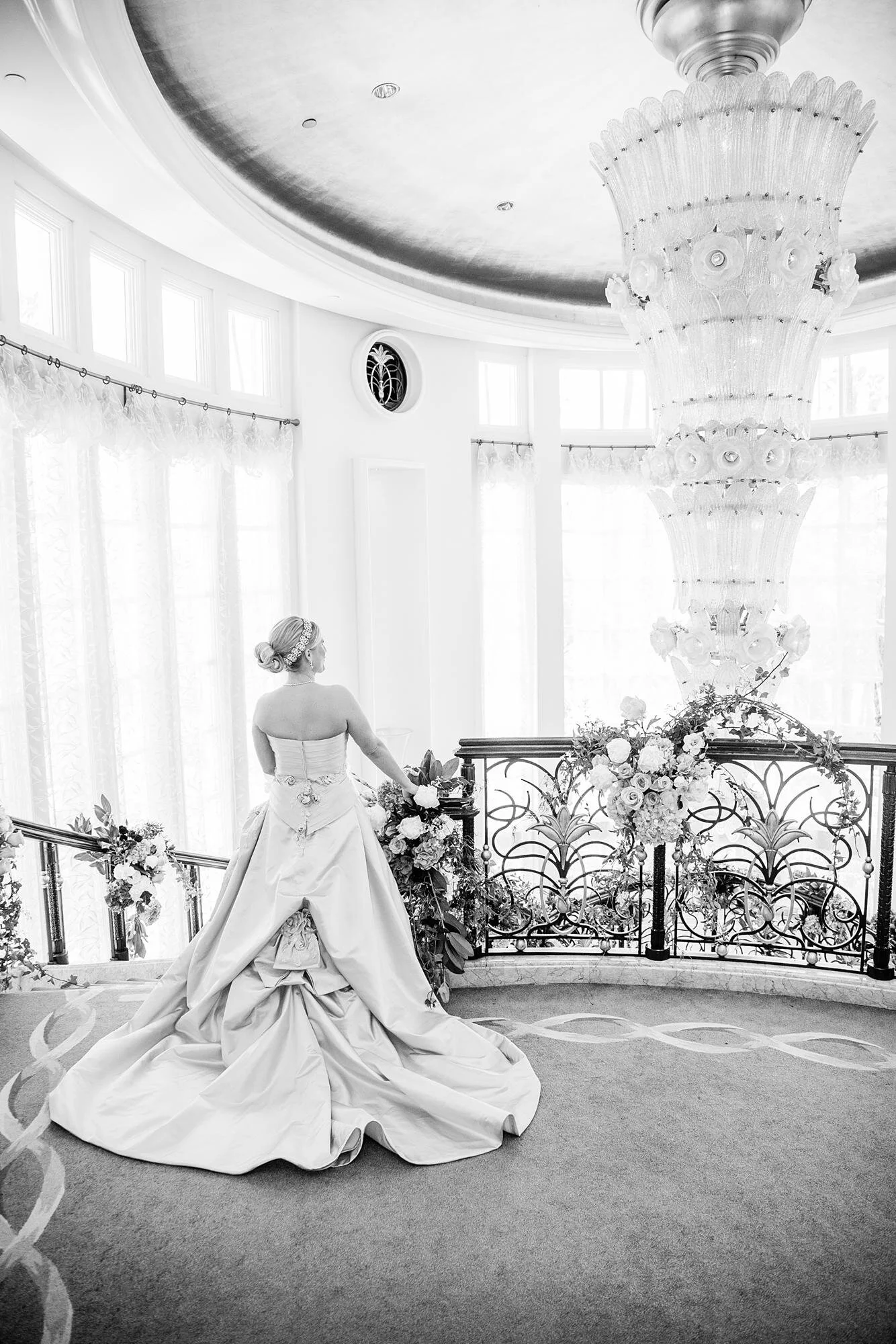 Wedding portrait of a bride standing on the Grand Staircase at the Beverly Hills Hotel