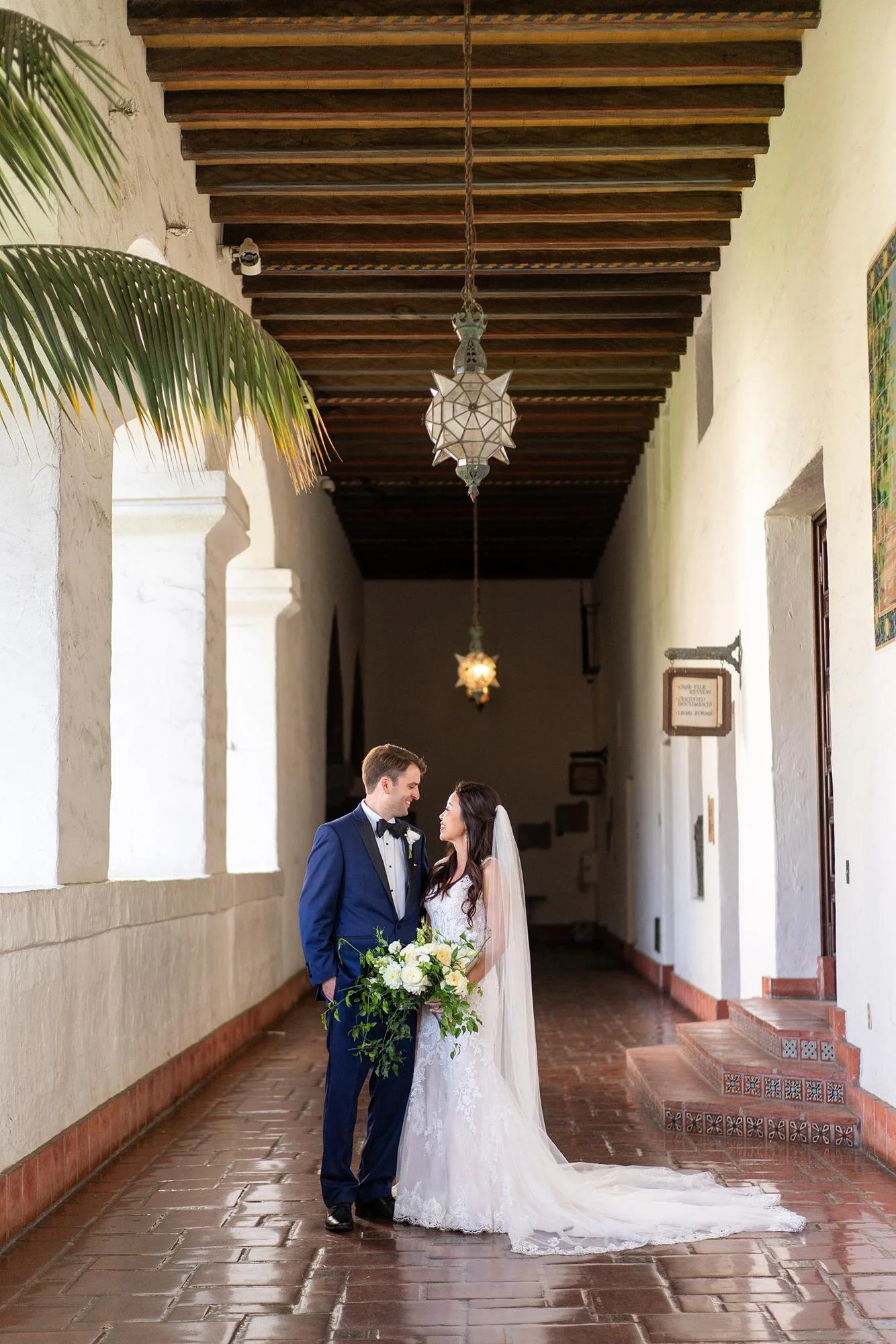 Wedding portrait in the hallway outside the Mural Room at the Santa Barbara Courthouse