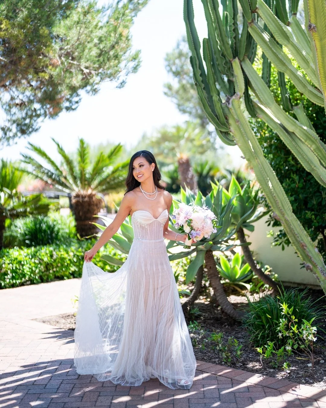 Perfection.

Venue: @terranearesort
Creative Design and Coordination: @masterplansevents
Beauty: @kellyzhangstudio @naturalglambyleann
Bridal Salon: @spinabride
Dress Designer: @lizmartinezbridal 
Video: @boffovideo
Florist: @wenfloral
Escort Wall: @