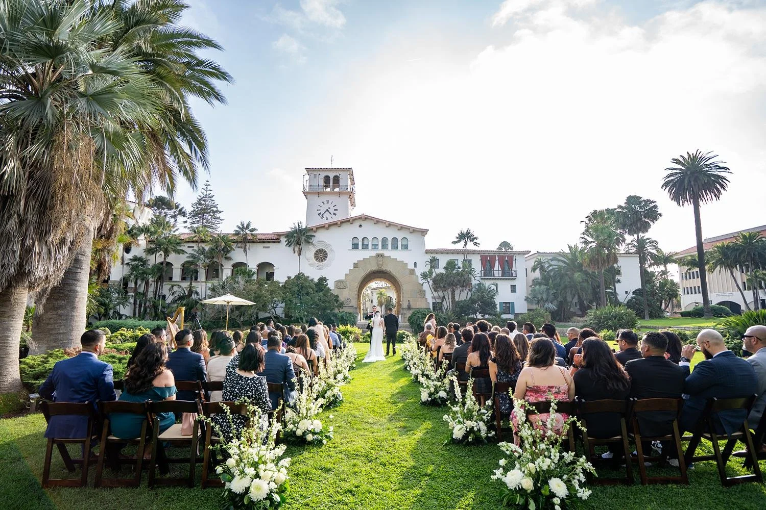 Wedding ceremony in the Sunken Garden at the Santa Barbara Courthouse during the couple’s vows