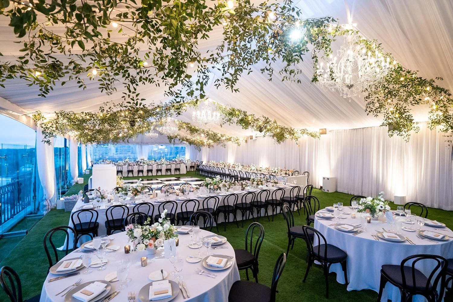 Wedding ceremony on the London West Hollywood West End Rooftop beneath a clear tent