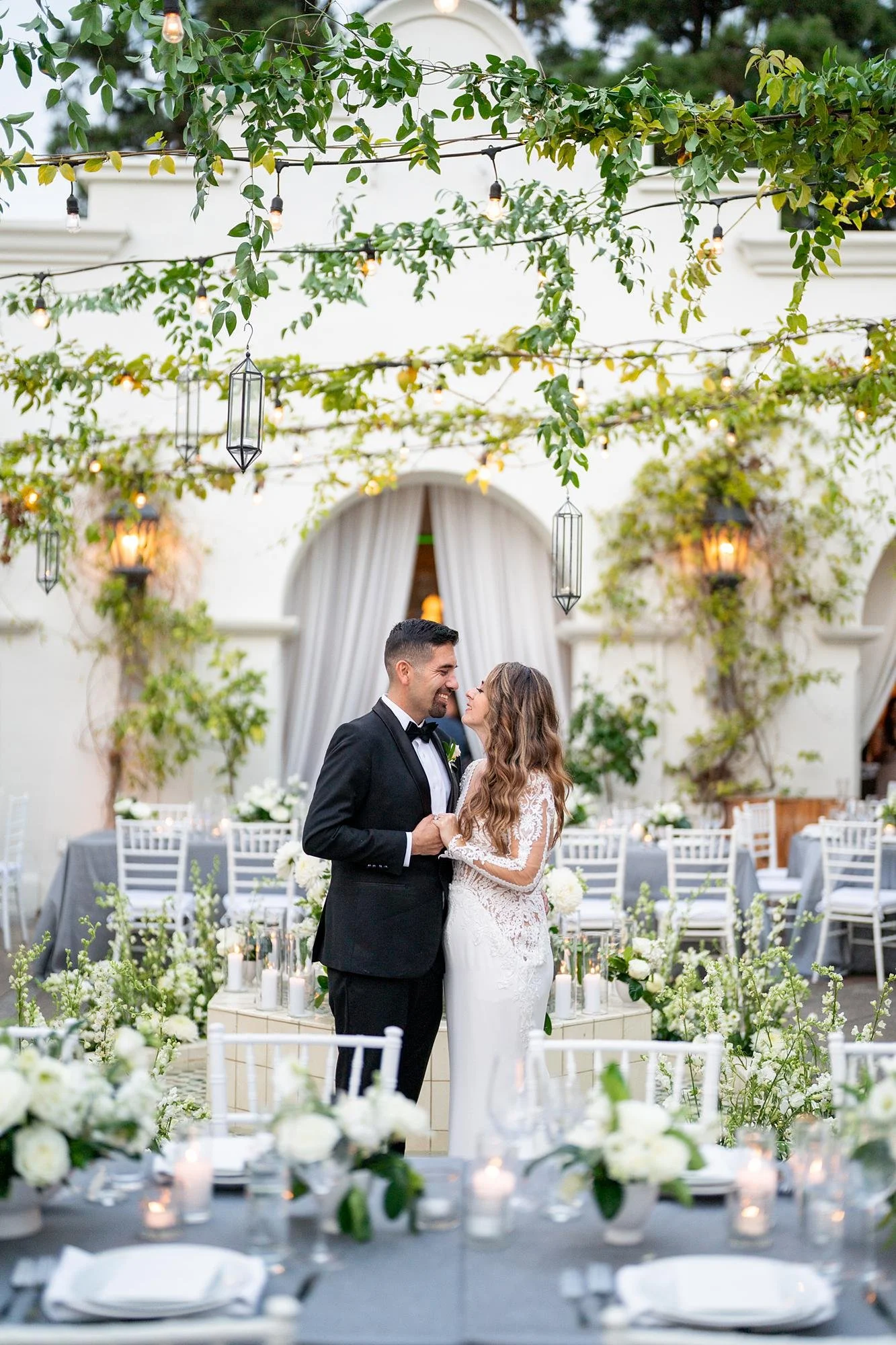 Wedding portraits at Villa and Vine with bride and groom in courtyard