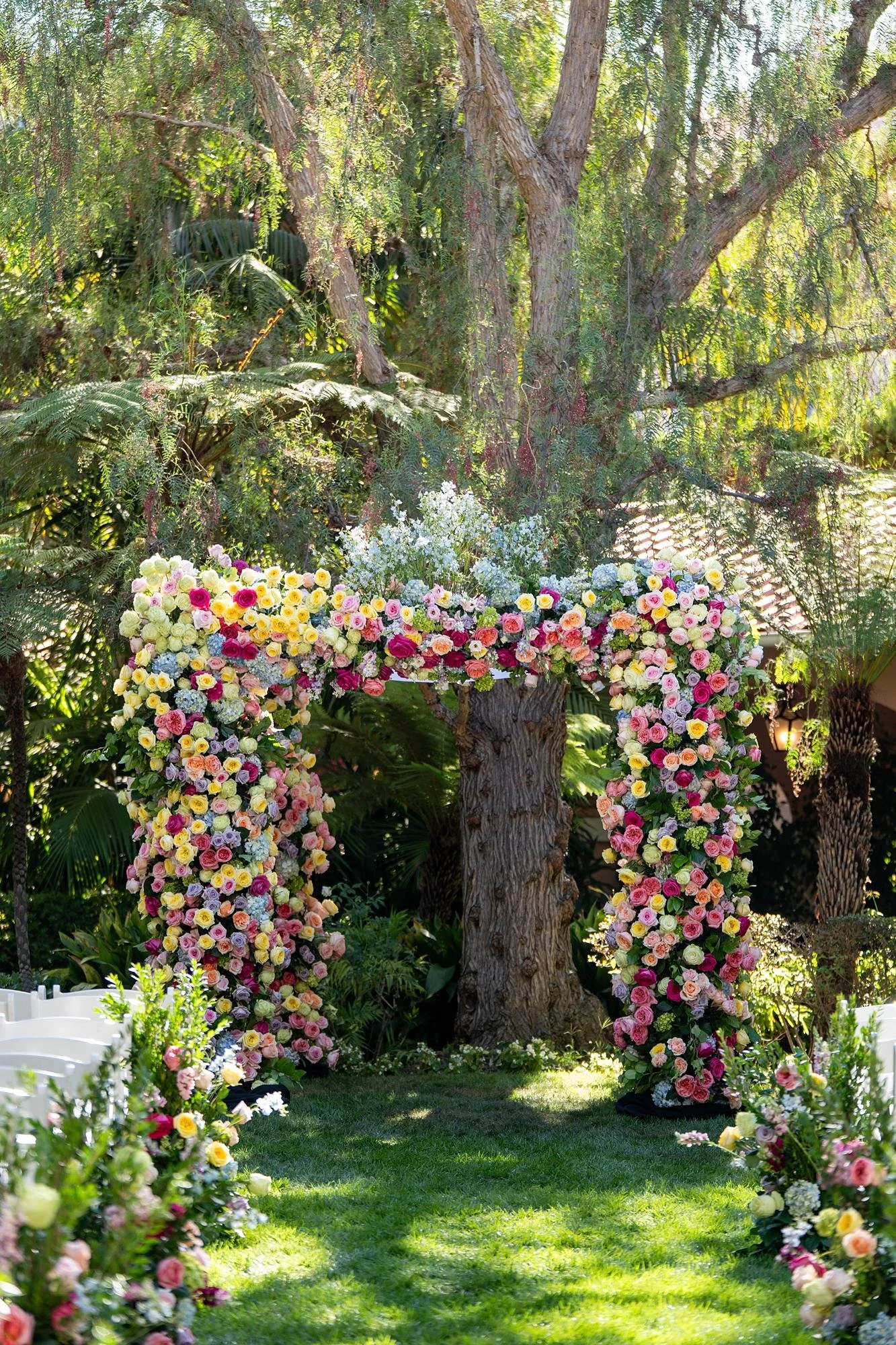 Wedding ceremony detail of a floral chuppah in the Polo Garden at the Beverly Hills Hotel
