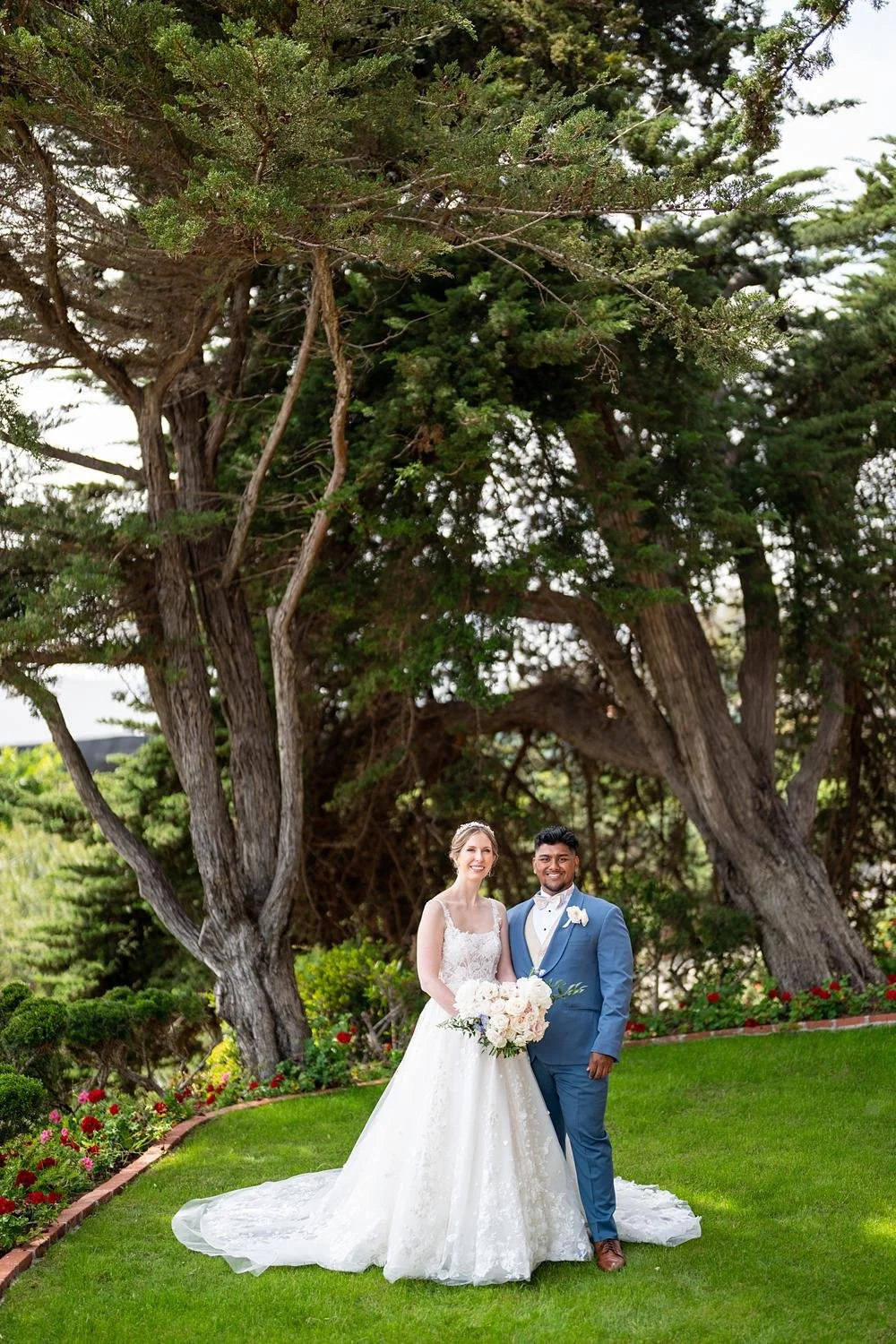 Wedding portraits of bride and groom among trees at Cypress Sea Cove