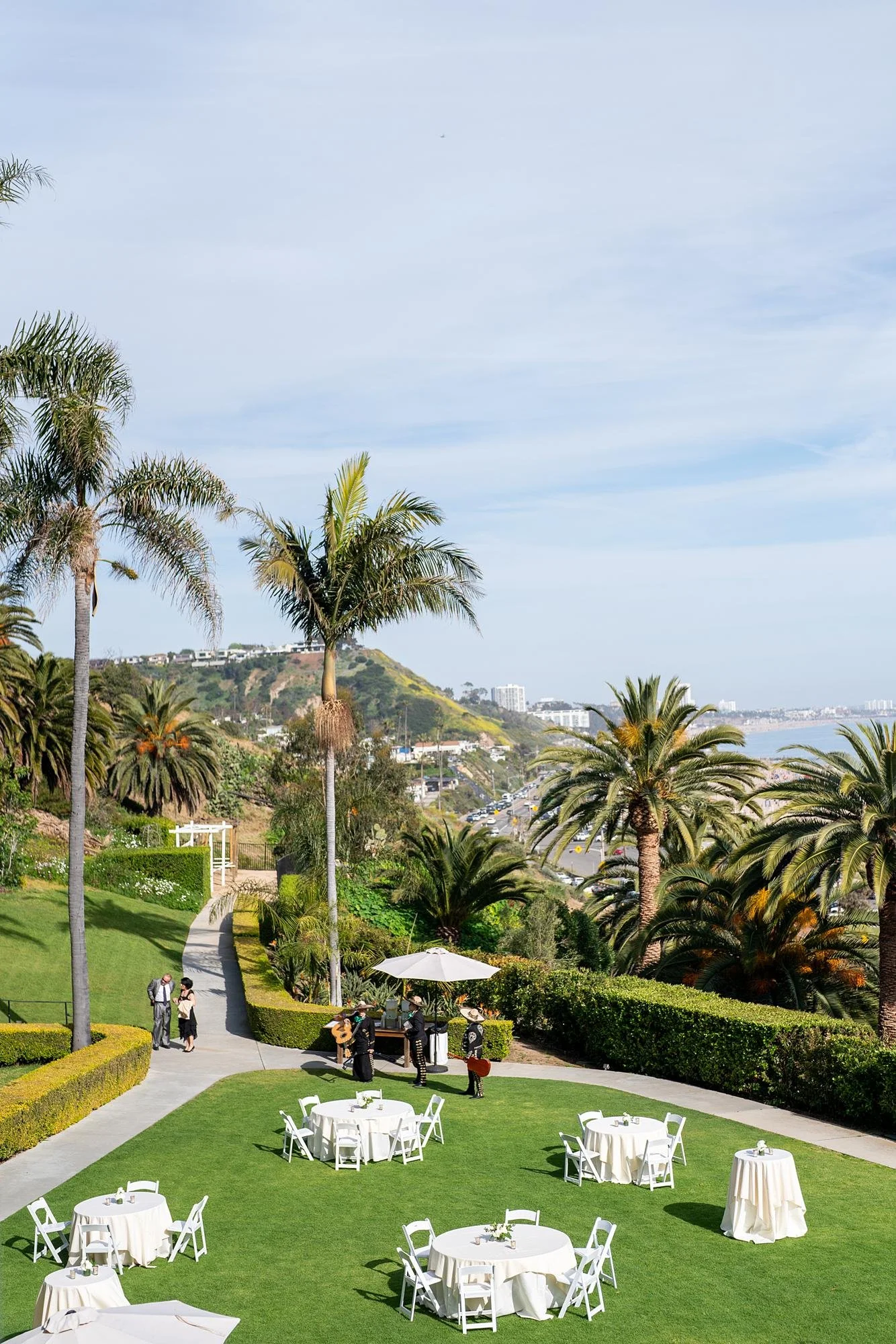 Overhead view of Ocean Lawn wedding cocktail setup with ocean views at Bel Air Bay Club