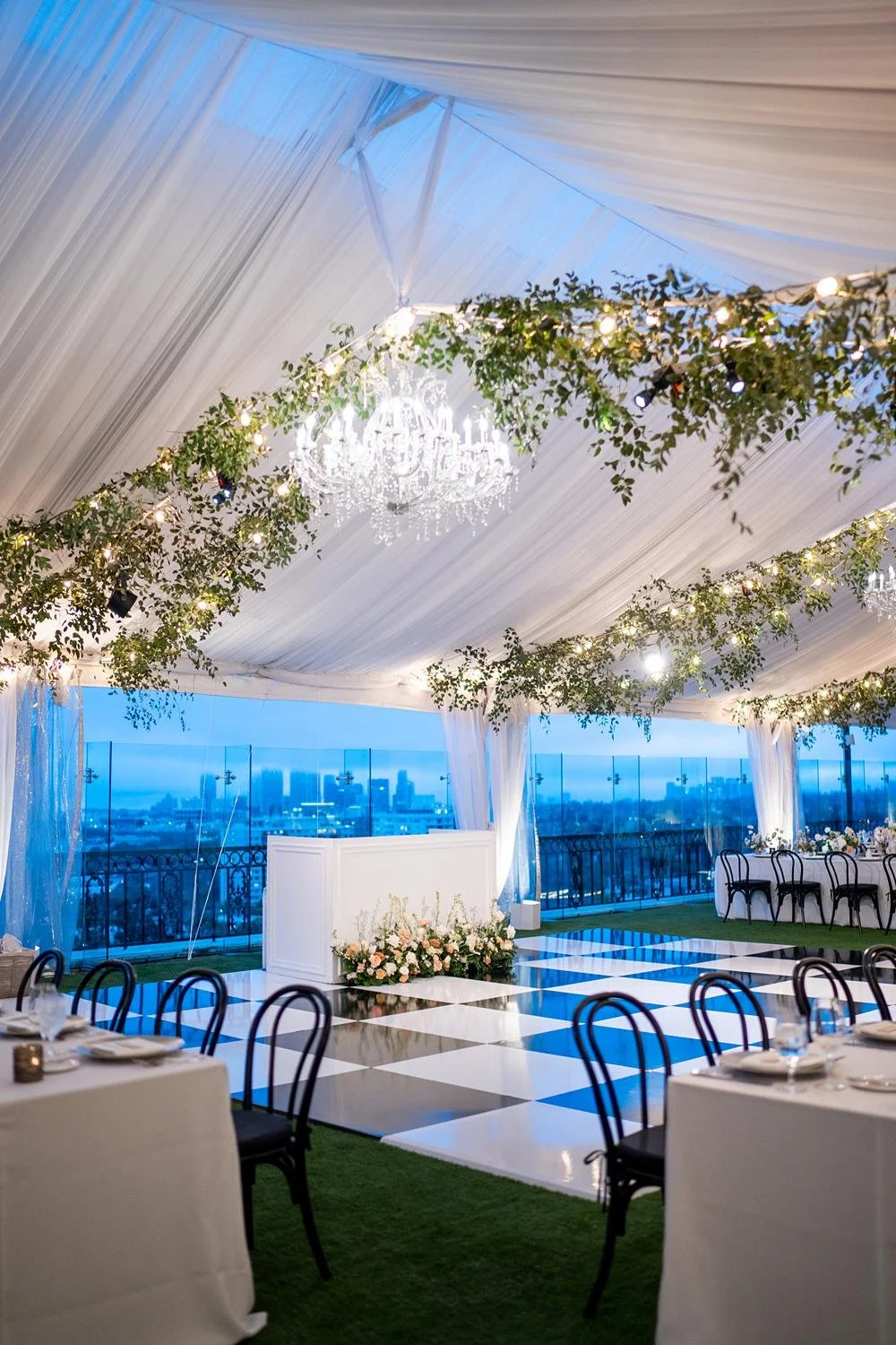 Wedding reception on the West End Rooftop at London West Hollywood with sweetheart table and checkered dance floor