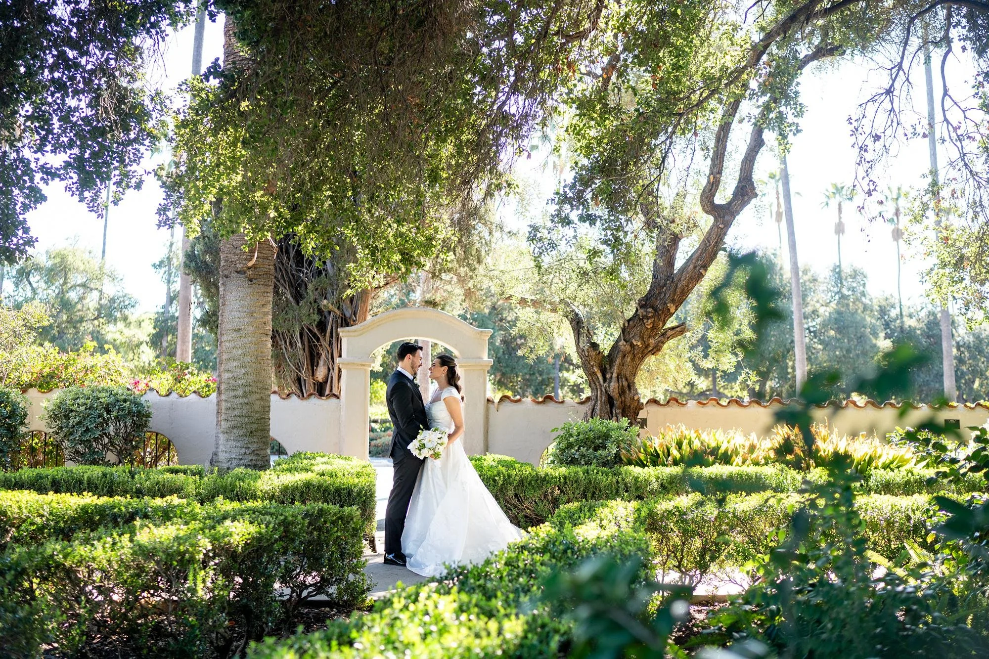 Portraits for a Landmark Mission Hills wedding featuring couple in garden setting