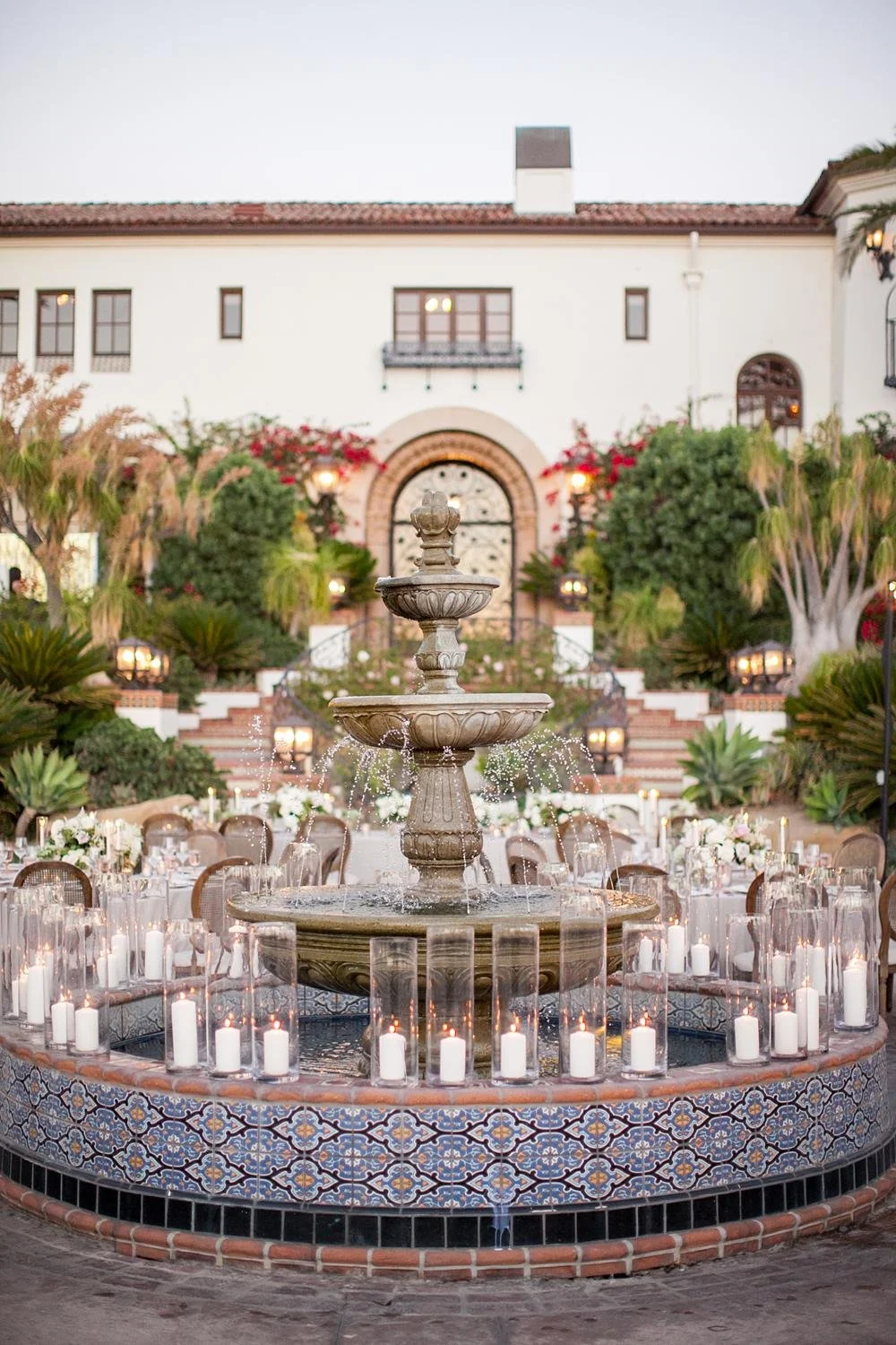 Fountain surrounded by candles in the center of a Villa wedding reception at Hummingbird Nest Ranch