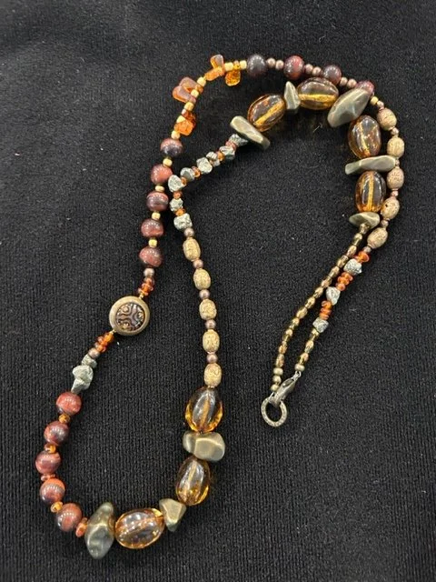 The Button of Tiger's Eye $125
