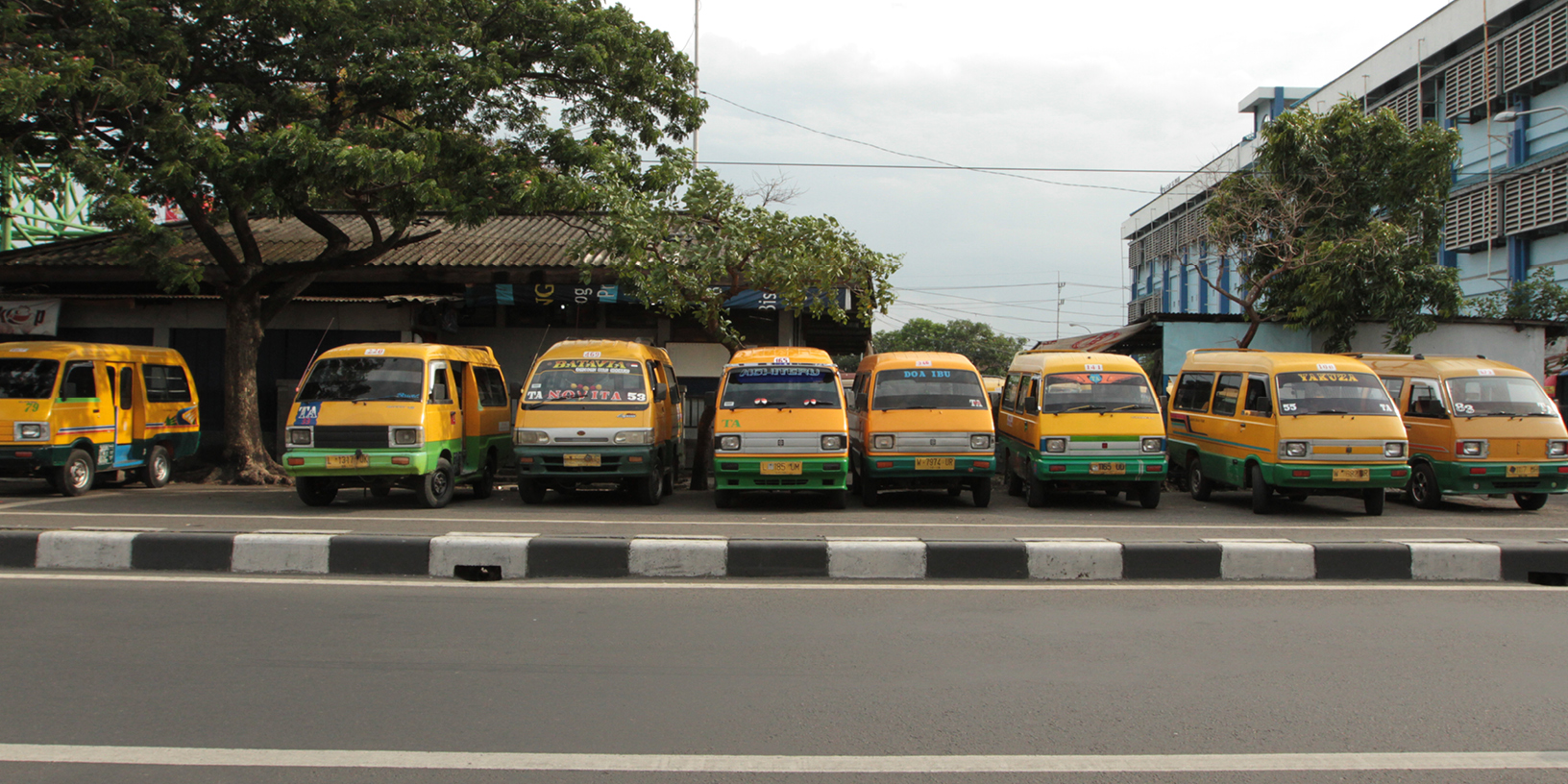  Angkots queue in front of Joyoboyo station before peak hour    