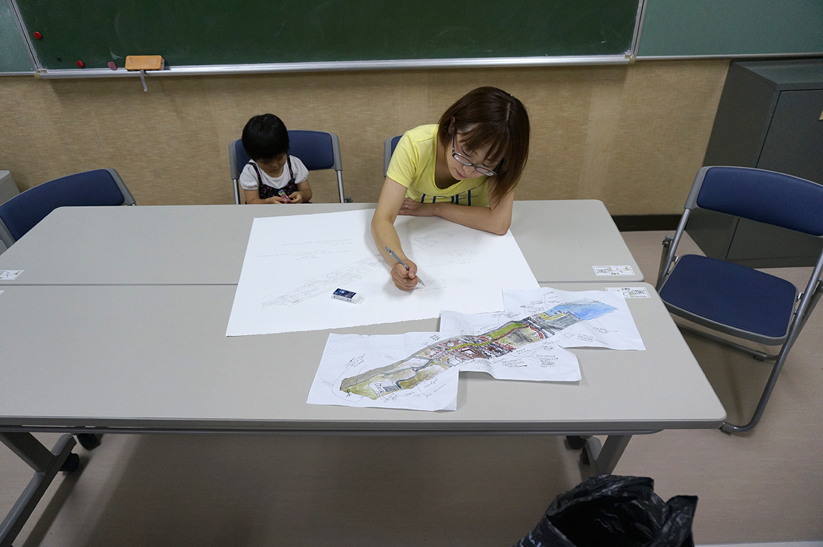 Minami Sanriku resident, Goto-san commenting on her transect drawing.